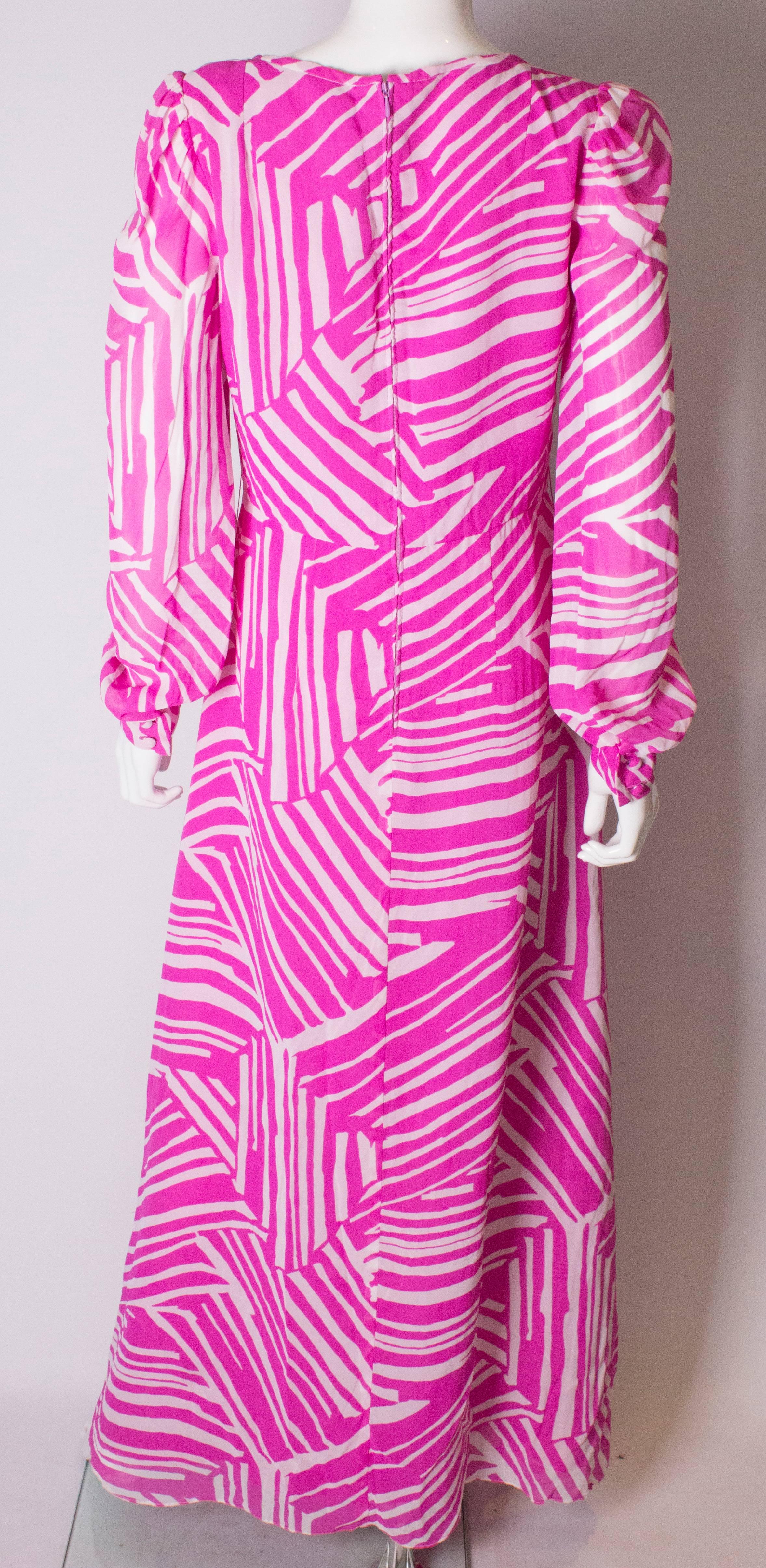 A Vintage 1970s abstract printed Pink and White evening Gown 3