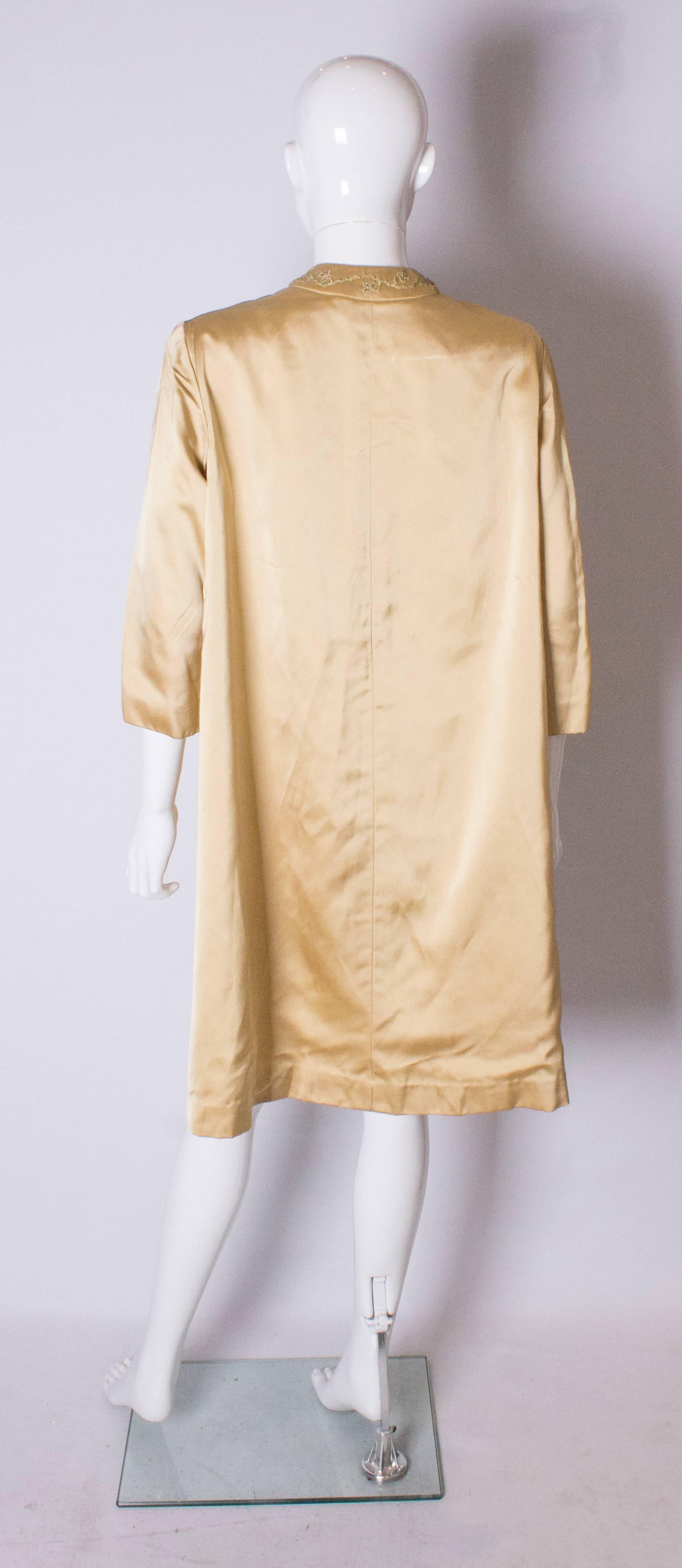 A Vintage 1960s Gold Saint Duster Coat by Carnegie  For Sale 1