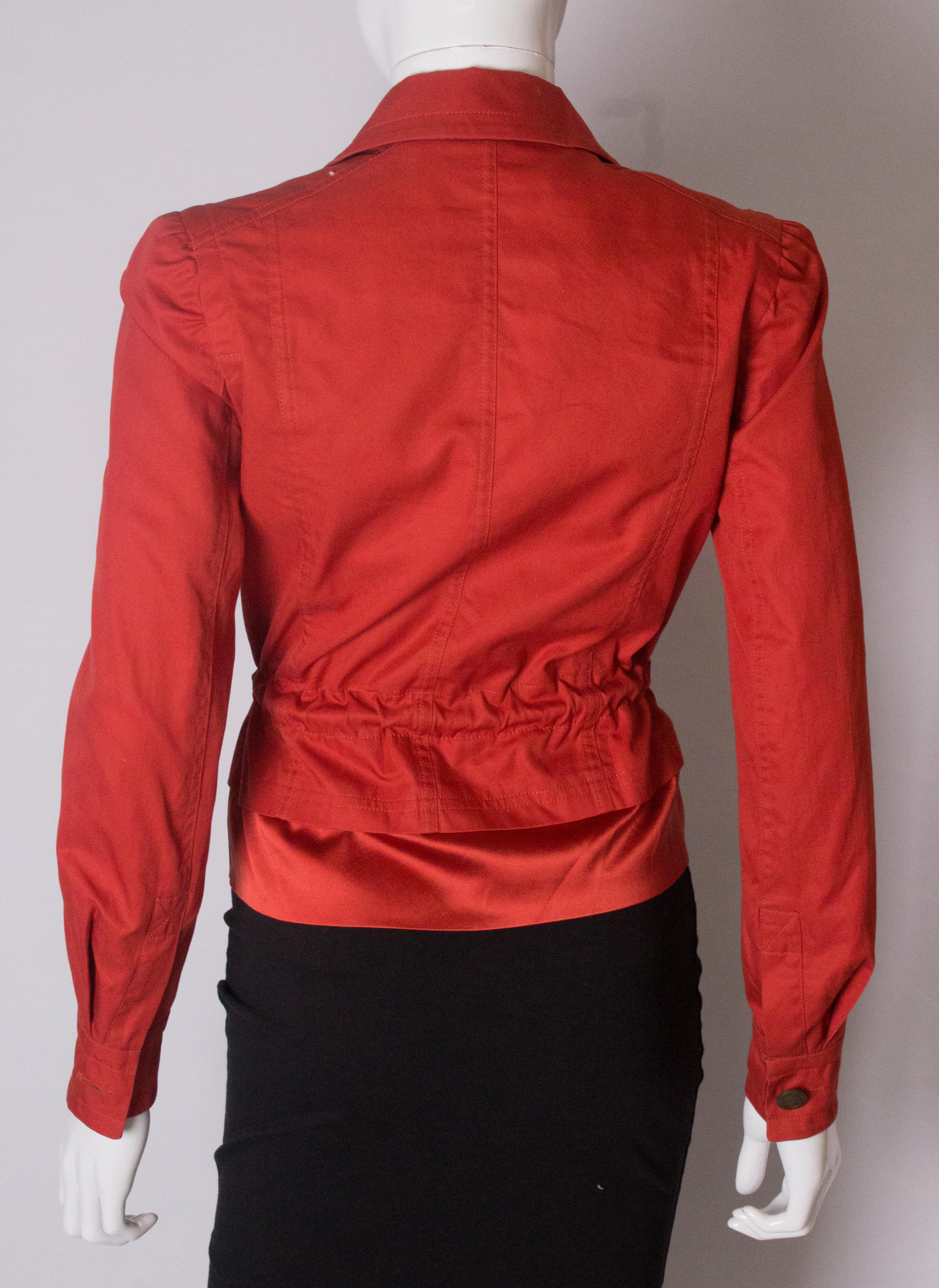 A Vintage 2000 red belted jacket by Yves Saint Laurent  3