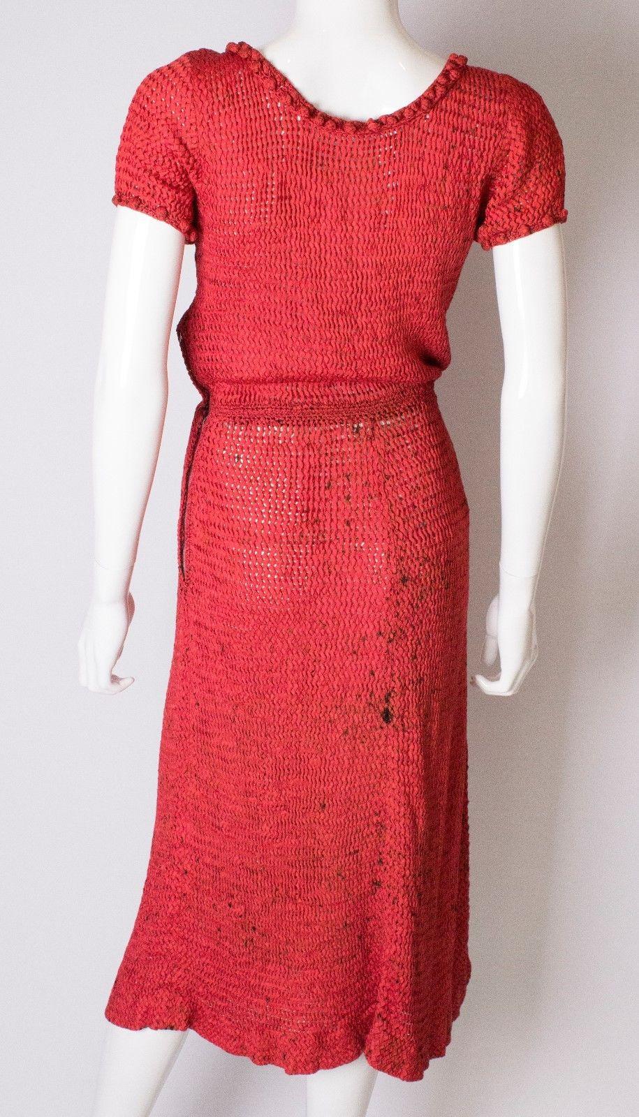 A vintage 1940s red and black ribbon 