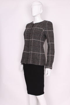 a vintage 1990s Chanel jacket in grey wool with zip front