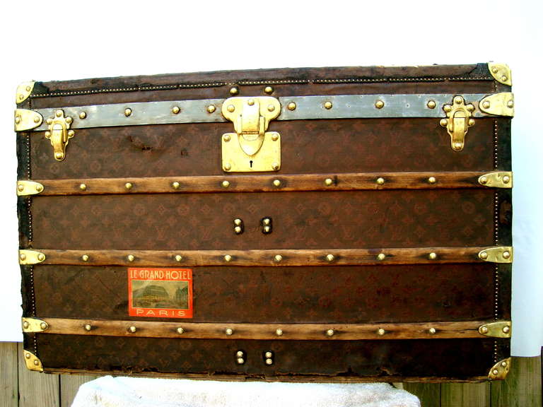 cool and unique antique louis vuitton steamer trunk circa 1903-04.  One of the first years of the printed LV monogram canvas.  Highest end model with all brass hardware and leather trim.  perfect coffee table size at 36x21x22.5