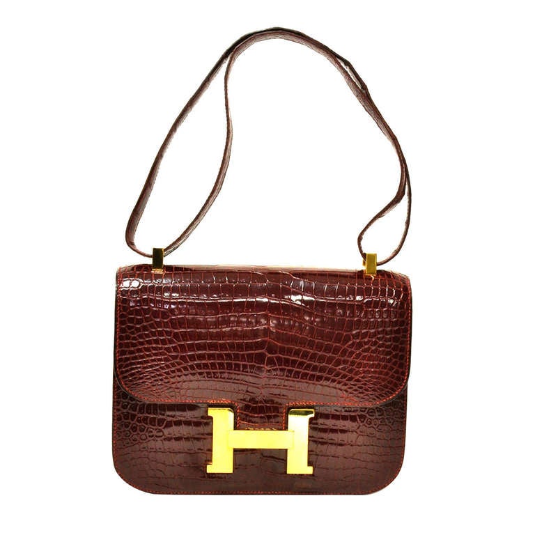 Vintage Hermes 22cm Constance in Burgundy Crocodile with Gold Hardware.