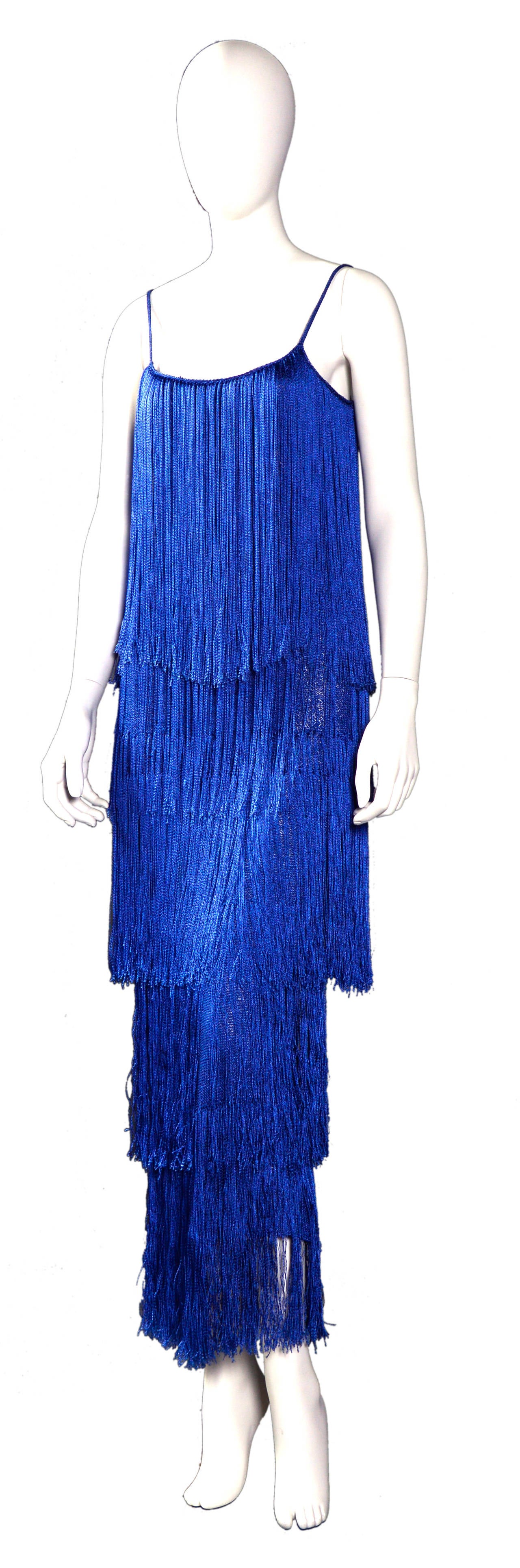 Gorgeous 70's Bleu fringed knit dress by Ann Salens but no label.
The extra layer under the fringed layer gives a heavy & perfect fit to the dress.
Size Small or extra small
