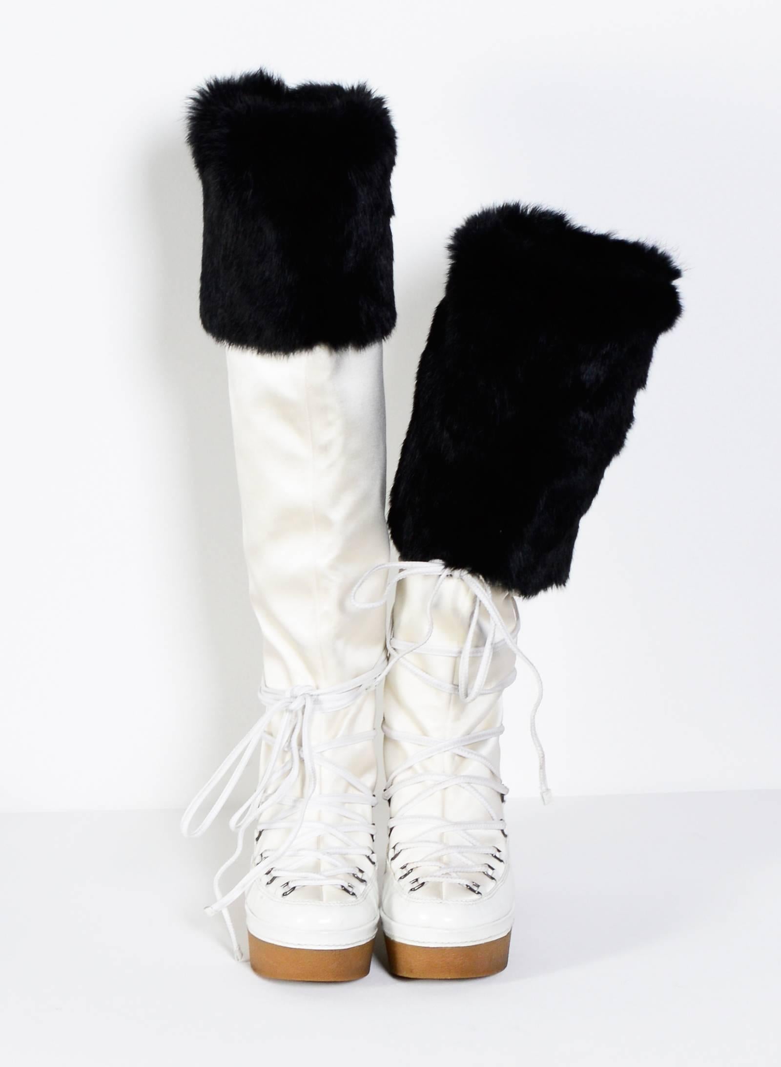 GIVENCHY / Alexander McQueen Boots : made in white patent leather & satin, trimmed with black fur. This boots have not seen the snow yet, maybe worn once, a few nearly invisible marks. Size 39  