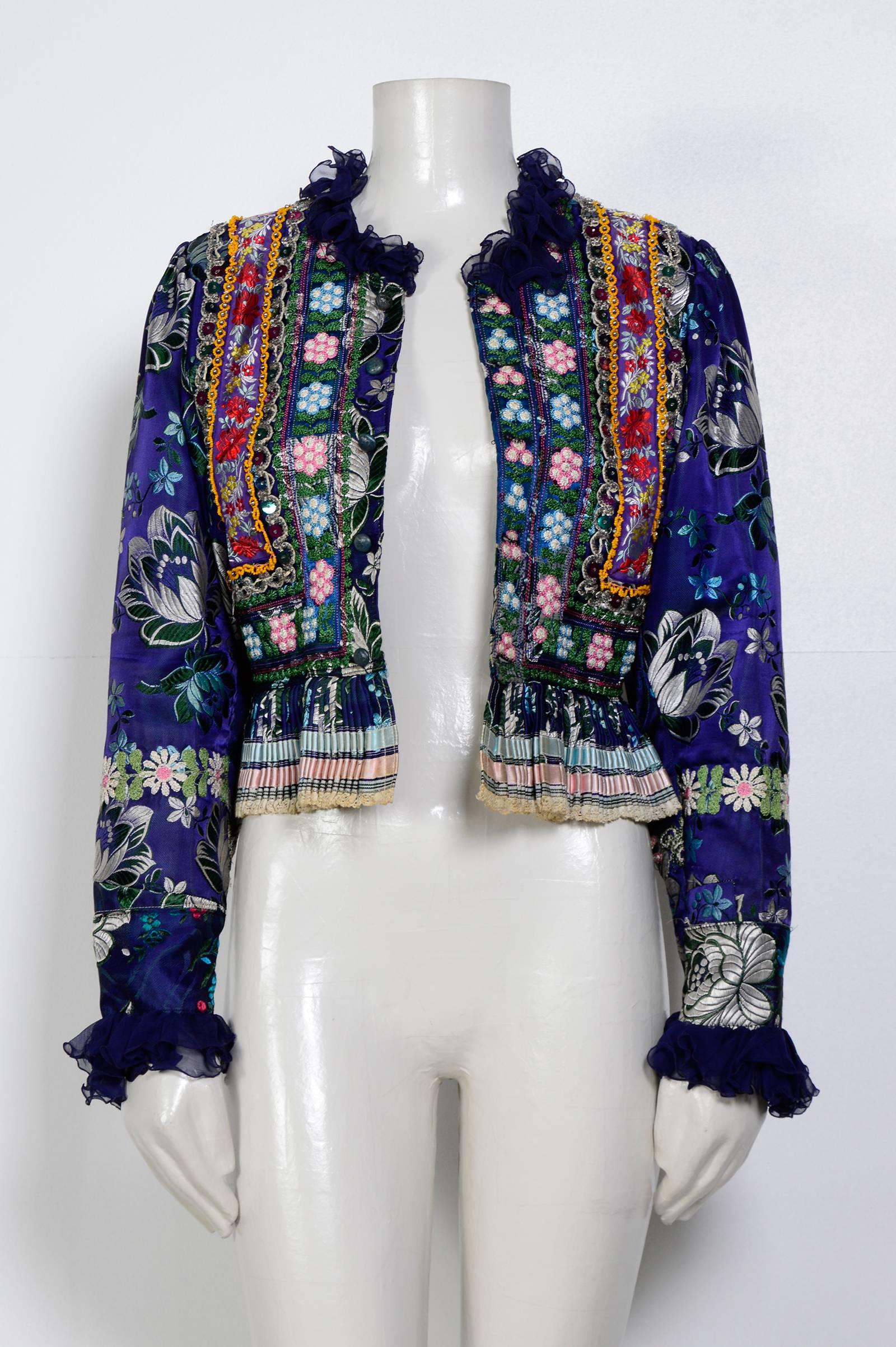 Incredible Ethnic Boho hand made embroidered jacket.
A few sequins missing, but hardly noticeable.
Measurements taken flat in inches
Sh to Sh 14