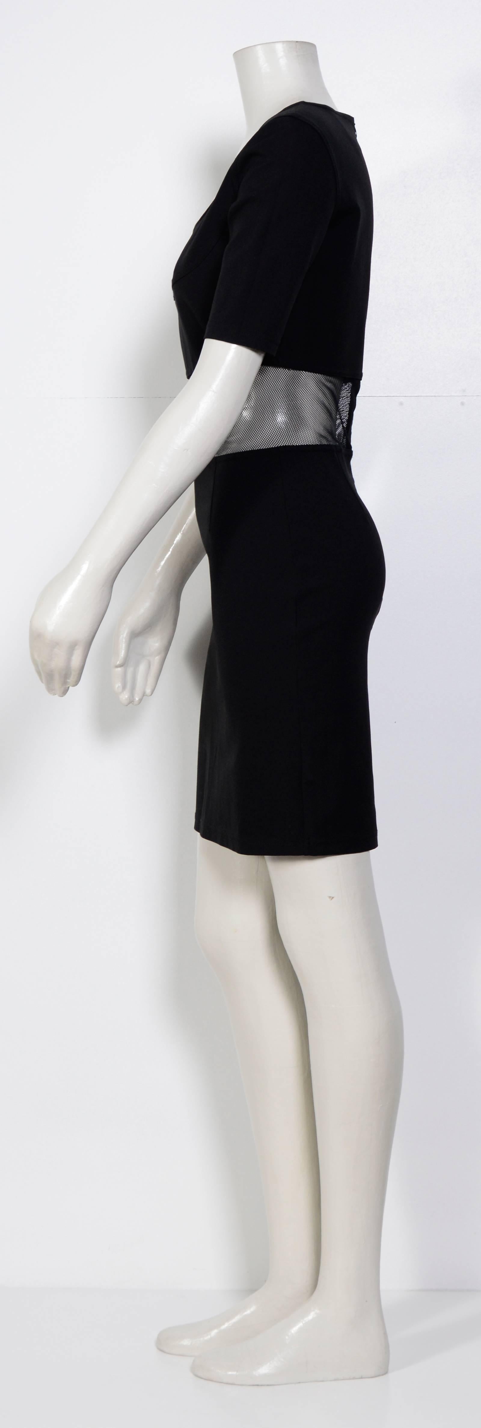 Black mesh panel dress from State Of Claude Montana Vintage featuring a scoop neck, short sleeves, a fitted silhouette, a short length and an invisible back zip fastening. 
Measurements are taken flat in inches without stretching the