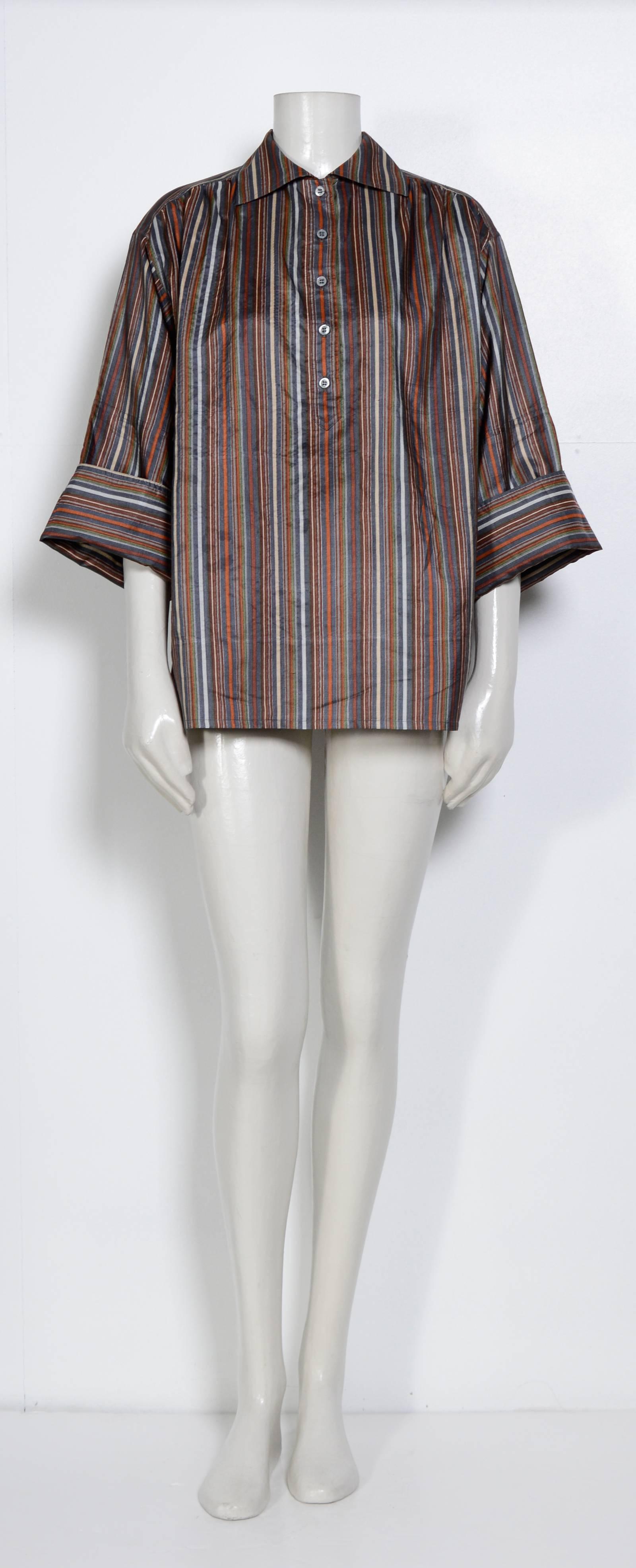 70's Silk Striped Blouse & Skirt Set  by Yves St Laurent "Rive Gauche"
French Size 38
Excellent condition
Measurements taken flat:
Top: Sh to Sh 19inch/48cm - Ua to Ua 25inch/63cm 
Skirt: Waist 13inch - 33cm  