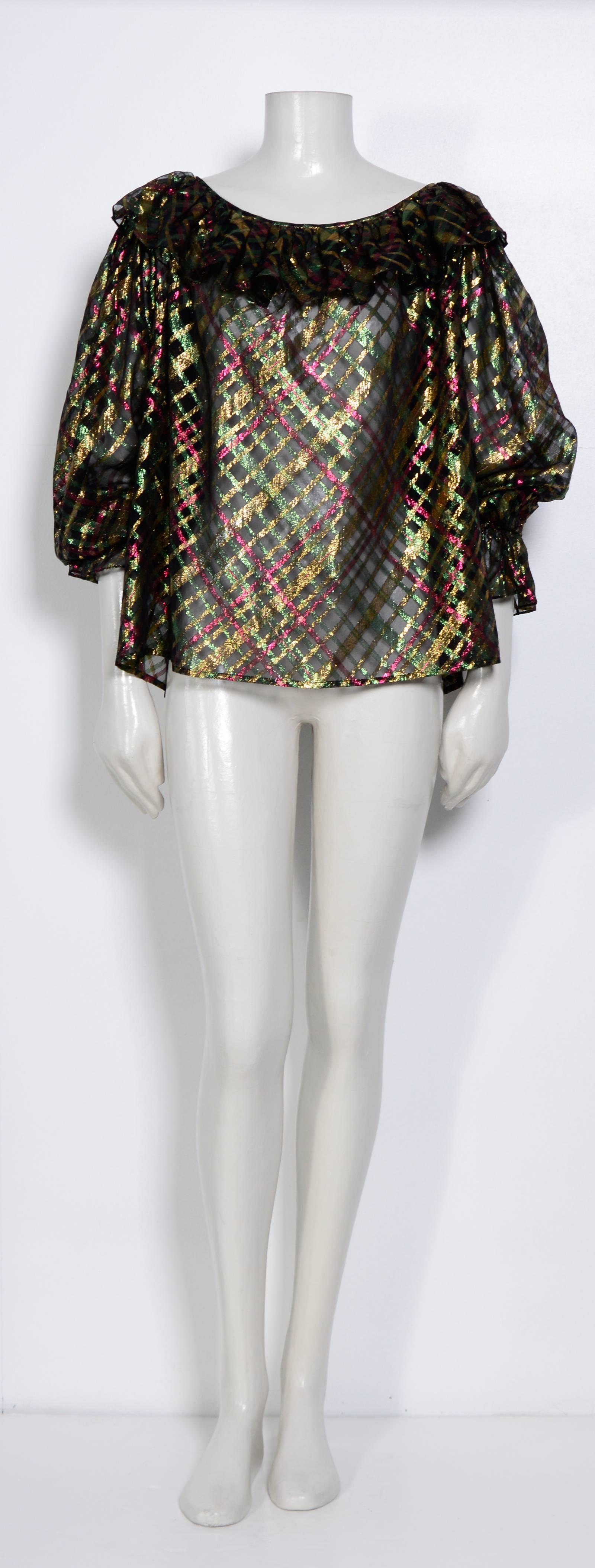 Stunning Yves Saint Laurent Silk Blouse. 
In excellent condition
French Size 42