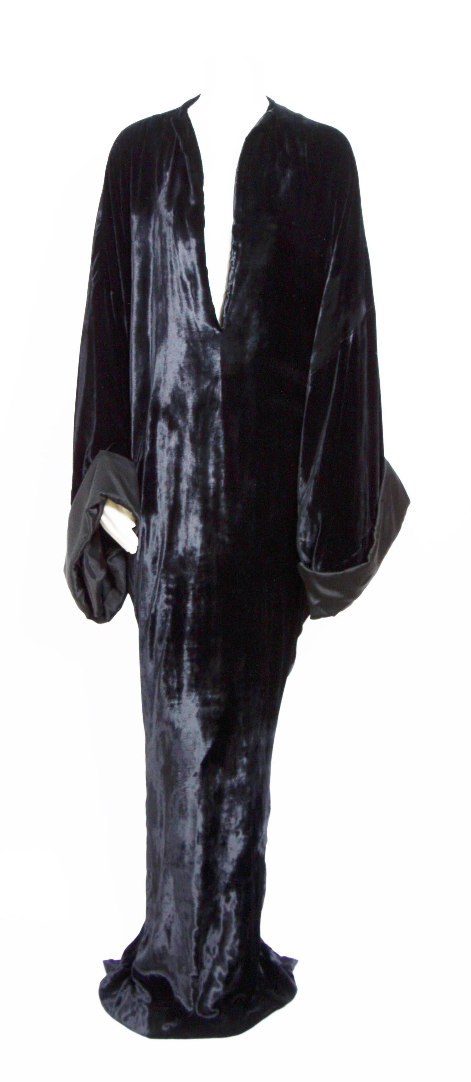 Dramatic "Runway 2013" Haider Ackermann deep black soft velvet caftan dress.
Lined, velvet & silk satin fabric used to make this stunning piece.
Size 36
Beautiful unworn condition.
Measurements taken flat.
Ua to Ua Free, Waist