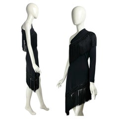 Robe Dolce & Gabbana printemps-été 2010 en jersey noir à une manche et à pompons
