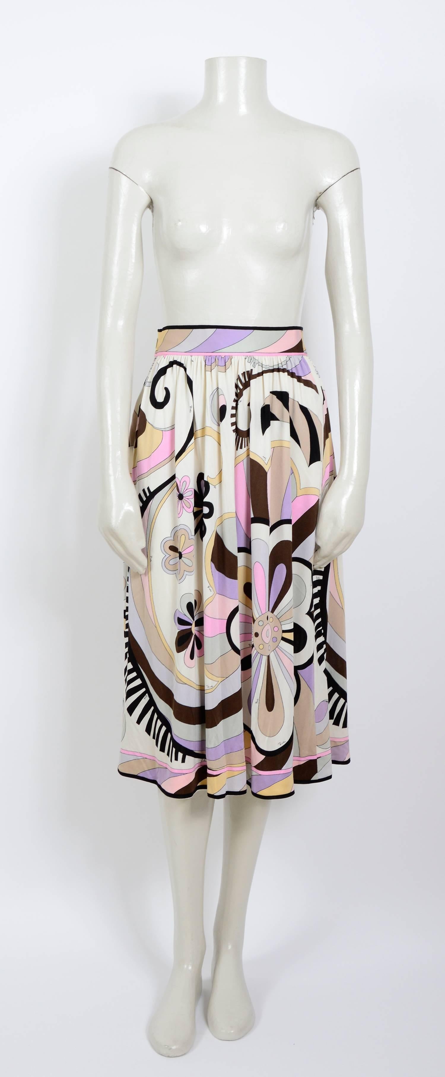 Vintage 1970s Emilio Pucci silk jersey signed skirt.
Measurements are taken flat:
Waist 12inch/31cm (x2)- Hip Free - Total Length 30inch/76cm