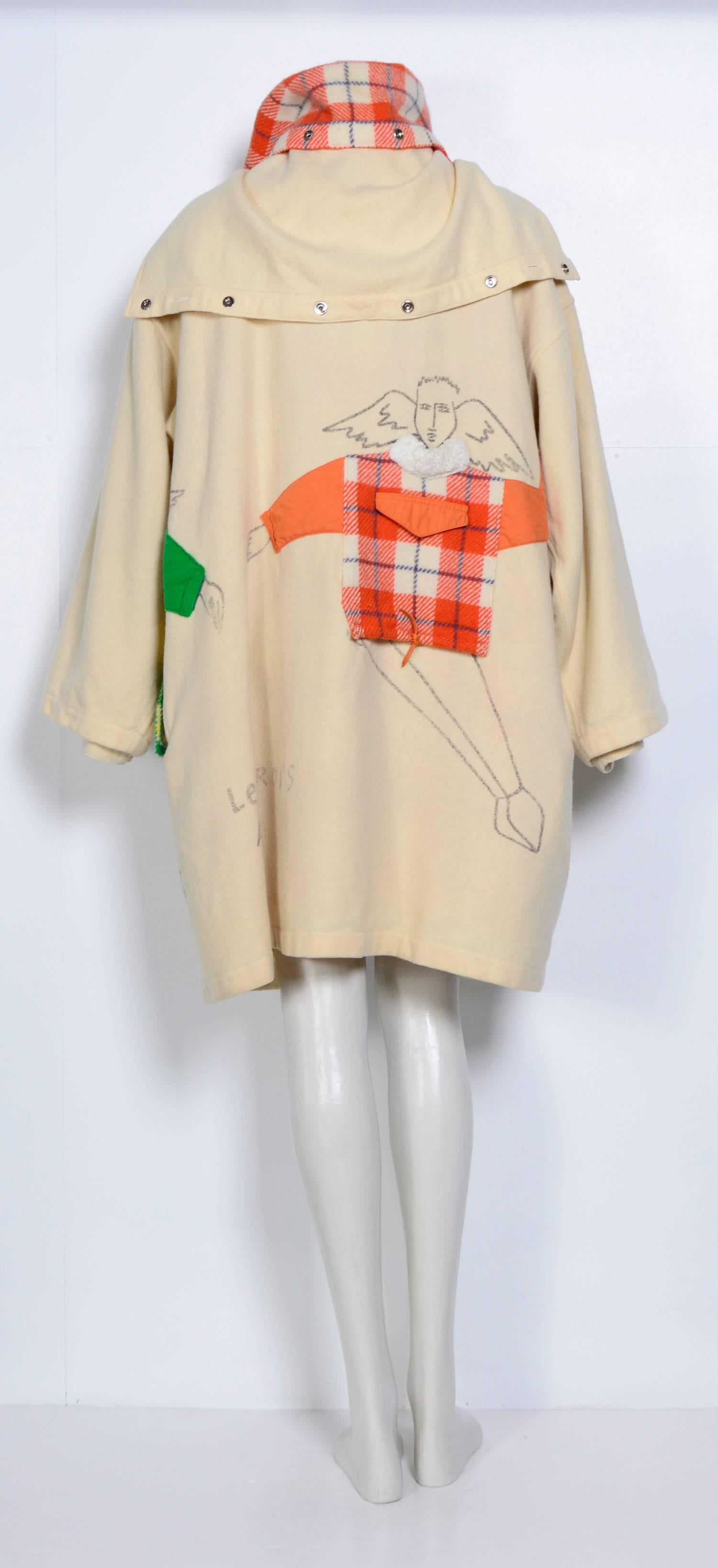 1993 Vintage Ko and Co coat by Jean-Charles de Castelbajac.  
Signed JCC at bottom right hem along with design name 