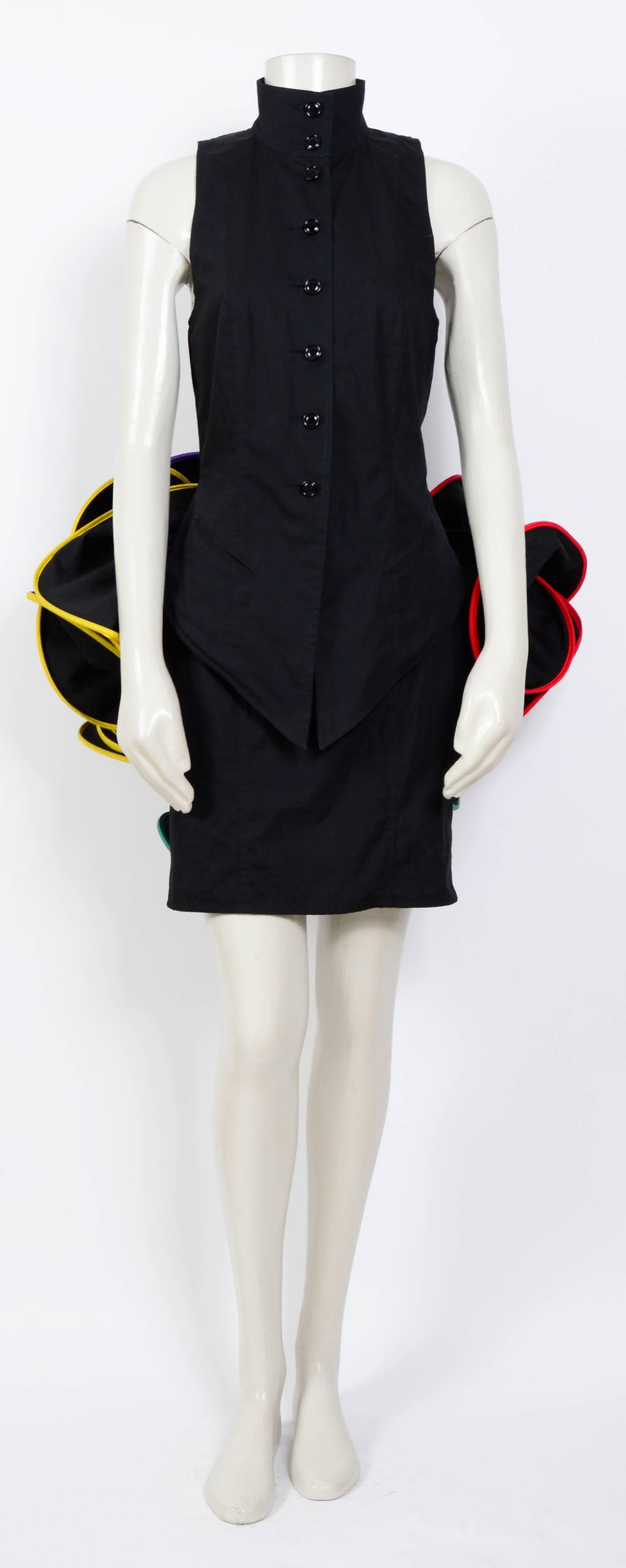 1980's black cotton skirt and gilet set by Popy Moreni.
Measurements taken flat:
Top: Ua to Ua 16inch/41cm - Waist 14inch/36cm
Skirt: Waist 13inch/33cm - Hip 18inch/46cm