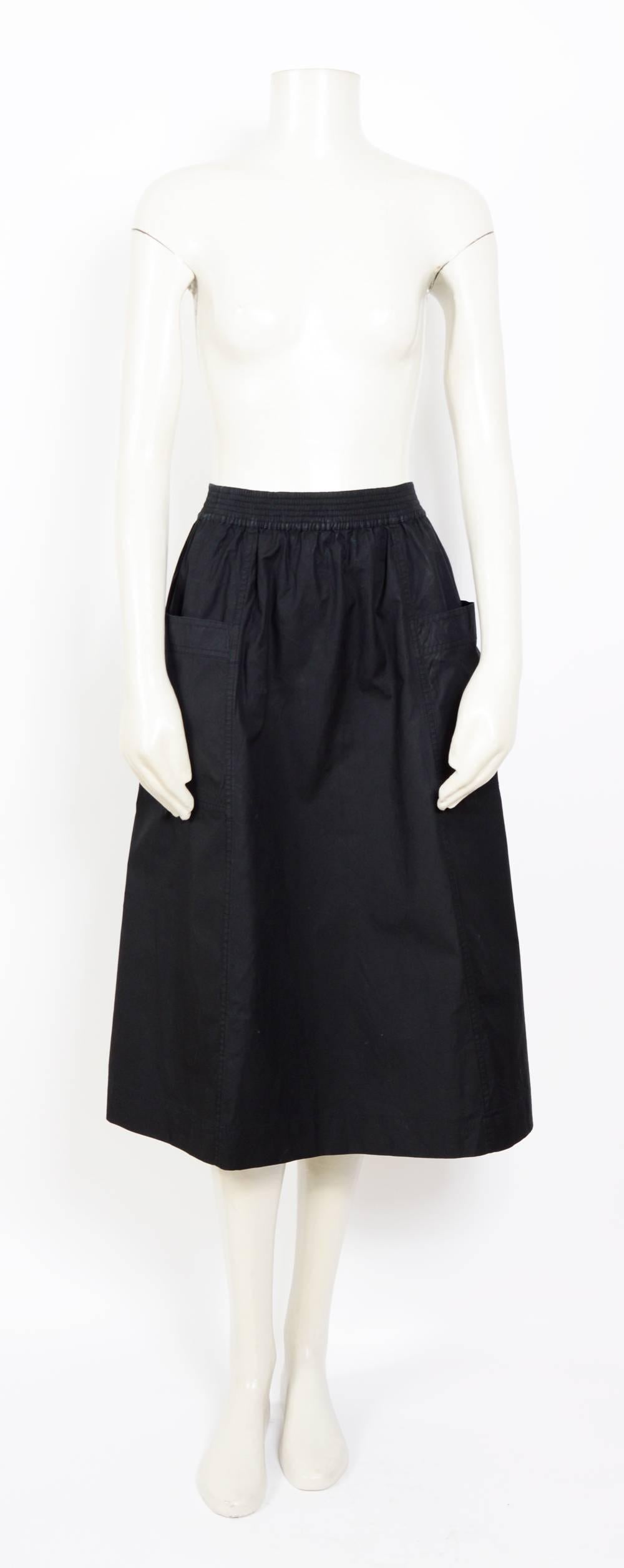 Beautiful crispy strong cotton black slip-on skirt by Yves Saint Laurent.
Elastic waist, big front pockets not lined. 
Perfect for spring/summer
French 36
Measurements are taken flat:
Waist unstretched 11,5inch/29cm(x2) - Stretched 14,5inch/37cm(x2)