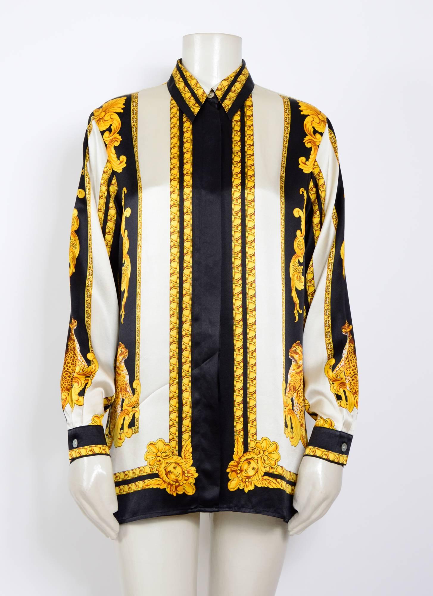 vintage 1980s tiger print shirt. 
Made in a very beautiful 100% silk.
Measurements are taken flat: Sh to Sh 16inch/41cm - Ua to Ua 20inch/51cm(x2) - Waist 20inch/51cm(x2) - Sleeve 23inch/58cm - Total length 29inch/74cm