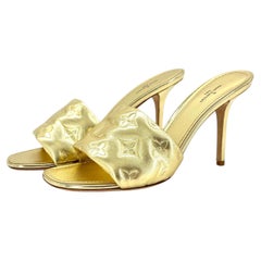 Louis Vuitton Revival Monogram Emboss Gold Leather Heeled Mules Sandals 38.5