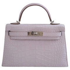 BNIB Hermès Mini Kelly 20 Mauve Pale Matte Alligator Palladium Hardware K Stamp BNIB Hermès Mini Kelly 20 Mauve Pale Matte Alligator Palladium Hardware K Stamp