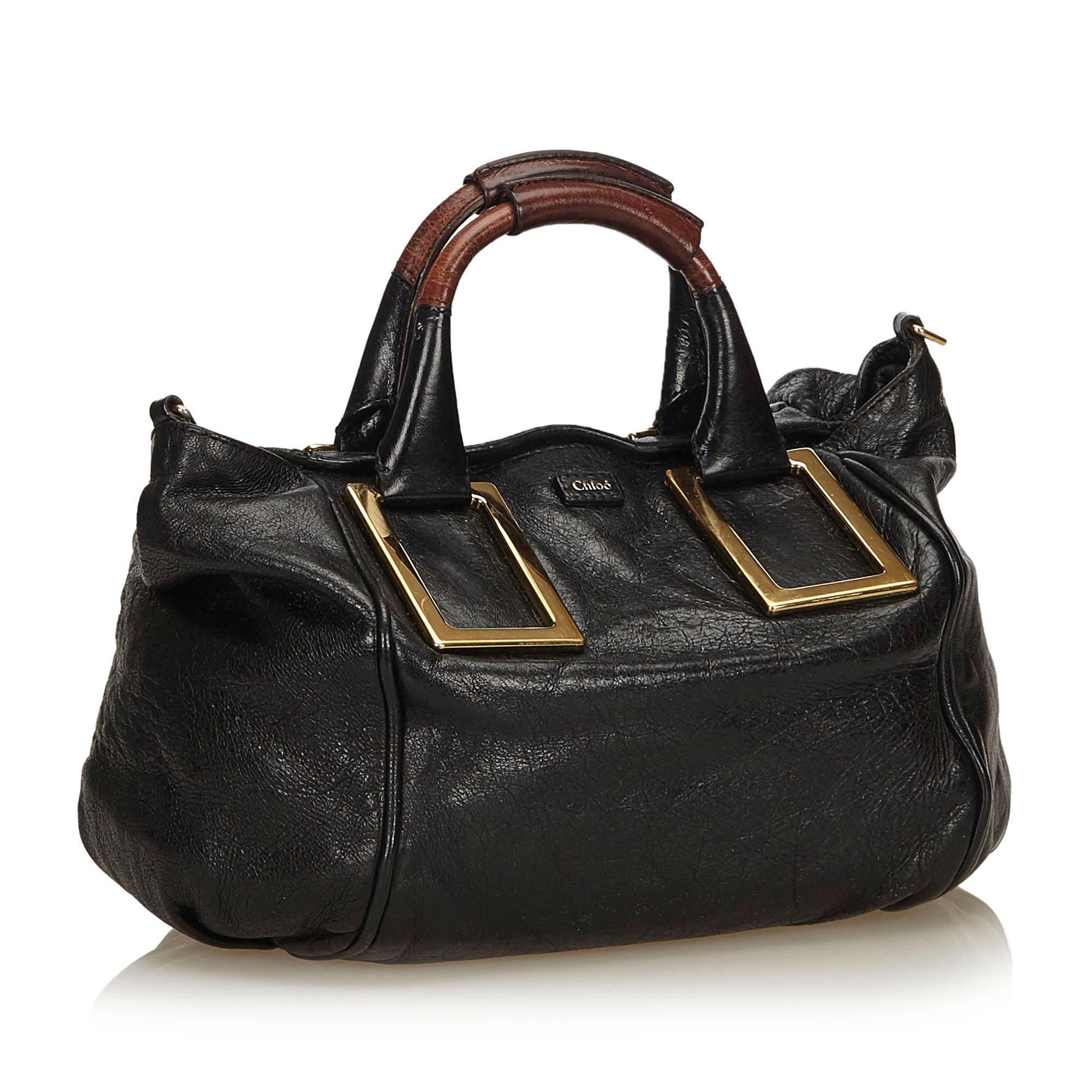 The Ethel features a leather body, rolled handles, gold-tone hardware, top zip closure, and interior zip pocket.

It carries a B condition rating.

Dimensions: 
Length 26.00 cm
Width 30.00 cm
Depth 13.00 cm
Shoulder Drop 7.00 cm

Inclusions: