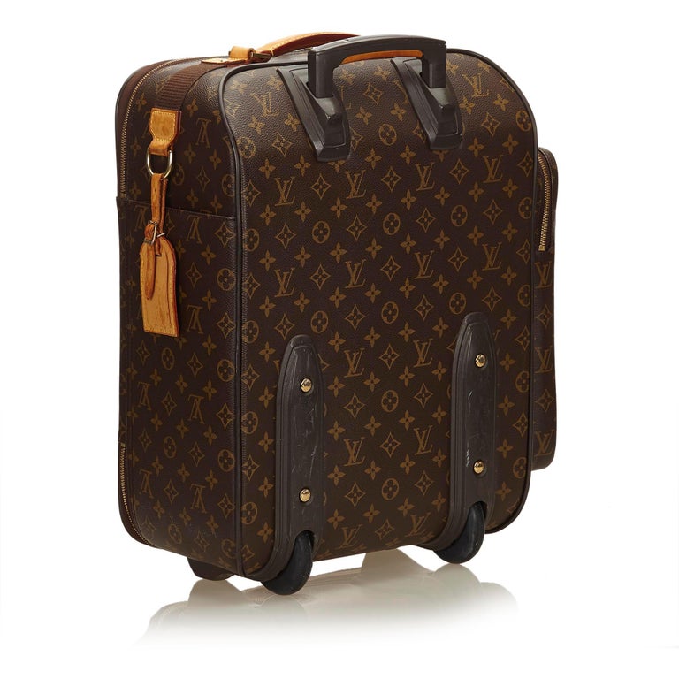 Louis vuitton brown luggage hi-res stock photography and images - Alamy