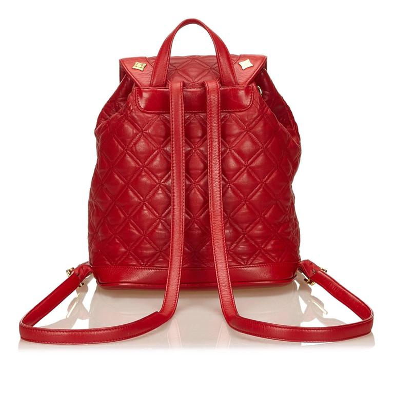 MCM Red Studded Leather Backpack For Sale at 1stdibs