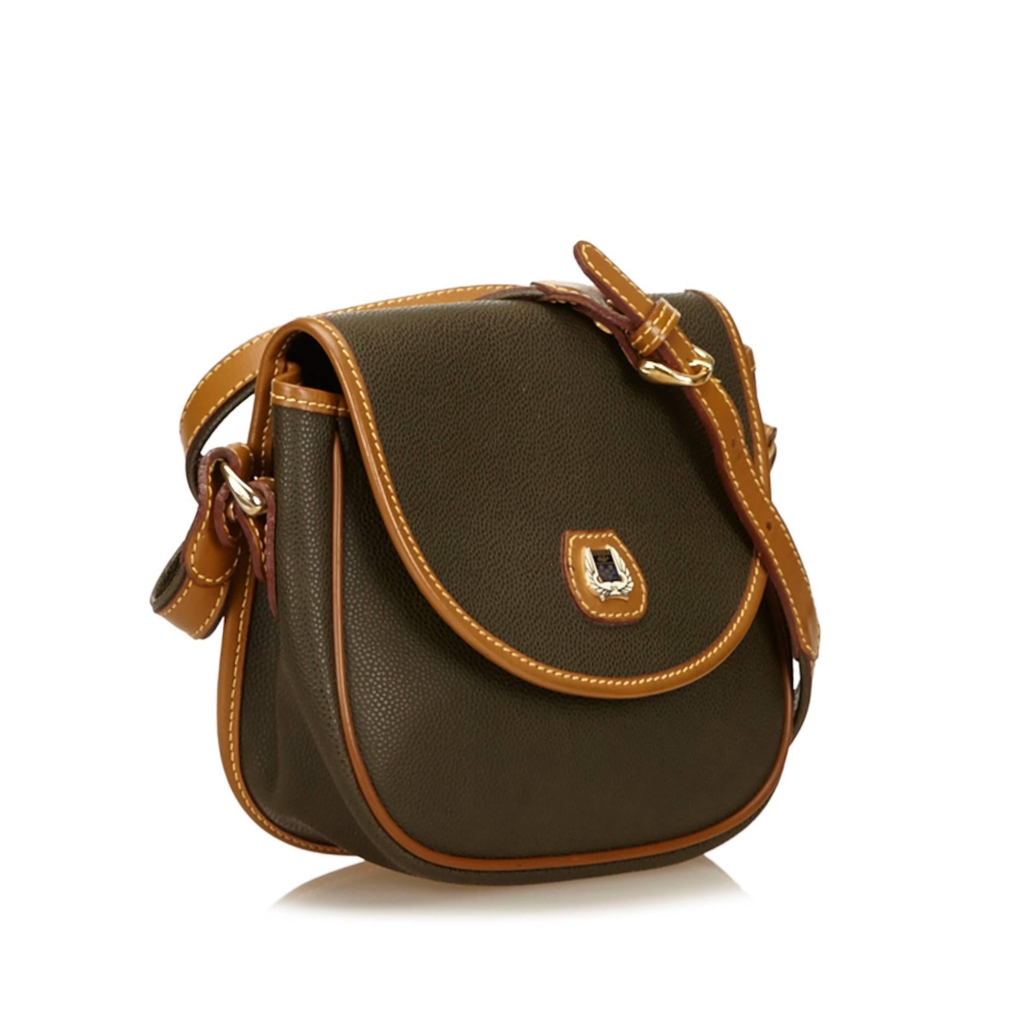 This shoulder bag features an embossed leather body, a flat strap, a front flap with a magnetic closure, and an interior zip pocket. It carries a B condition rating.

Inclusions: 
This item does not come with inclusions.