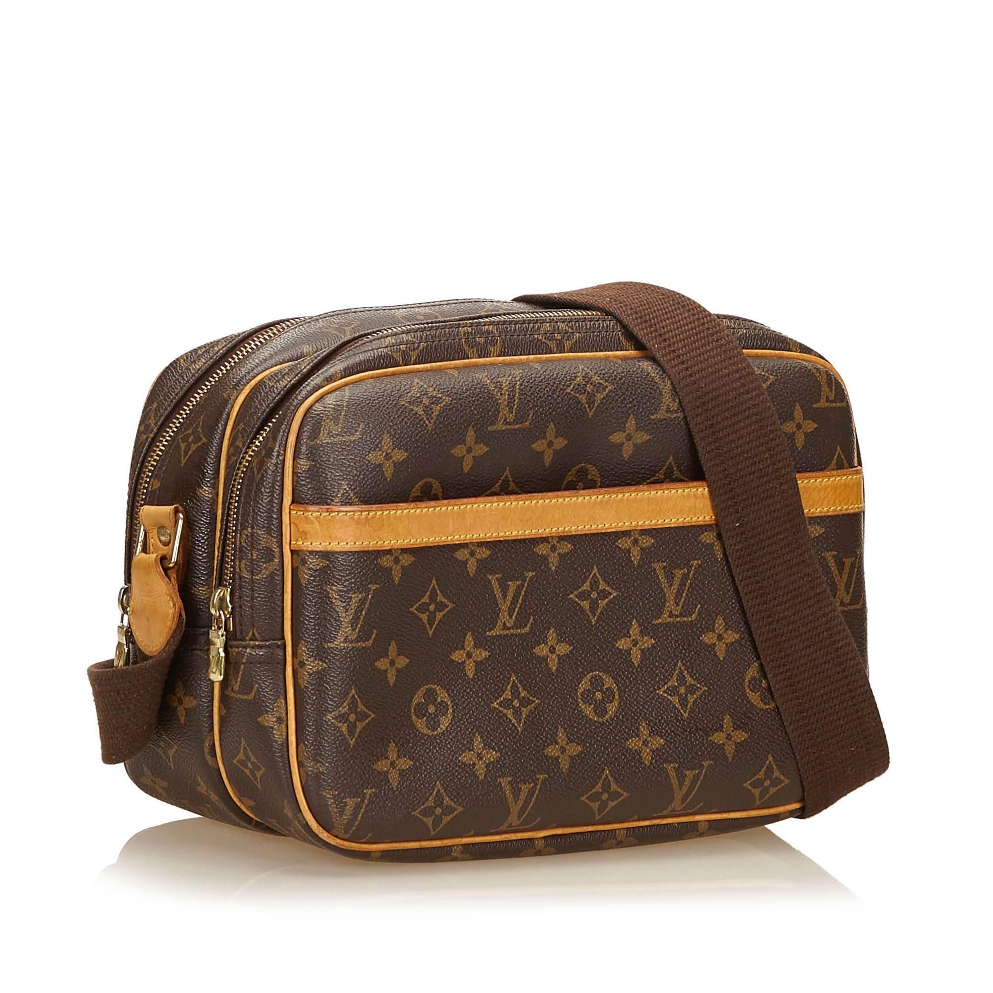 The Reporter PM features a monogram canvas body, an exterior slip pocket, top zip closures, and interior compartments. It carries a B condition rating.

Inclusions: 
This item does not come with inclusions.