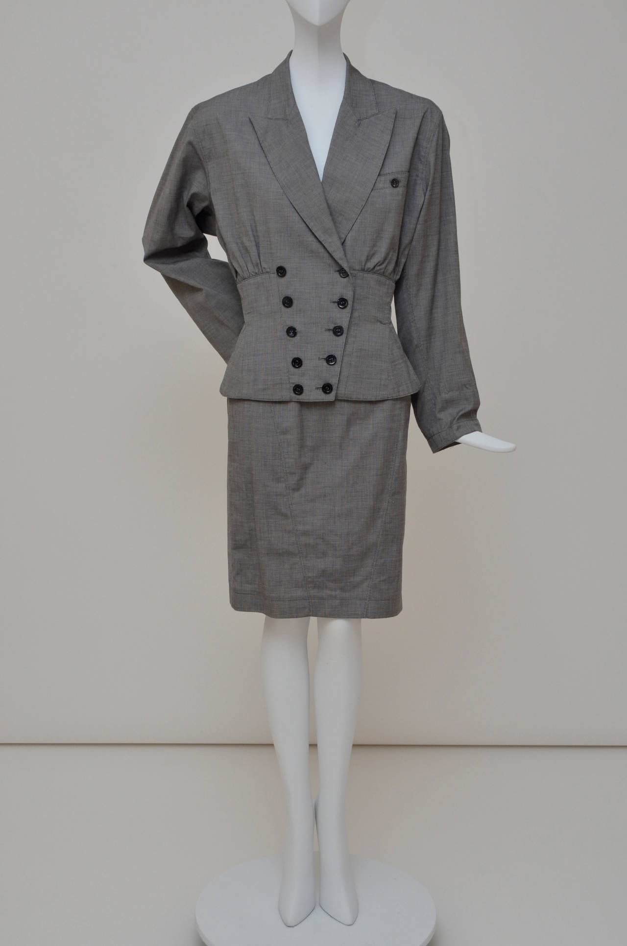 Azzedine Alaia early  beautiful vintage suit.
Size  8.(run small).
Condition:Like new mint.
This suit characterize  and represent Alaia unique style and cut.
Fabric 100% cotton.

FINAL SALE.