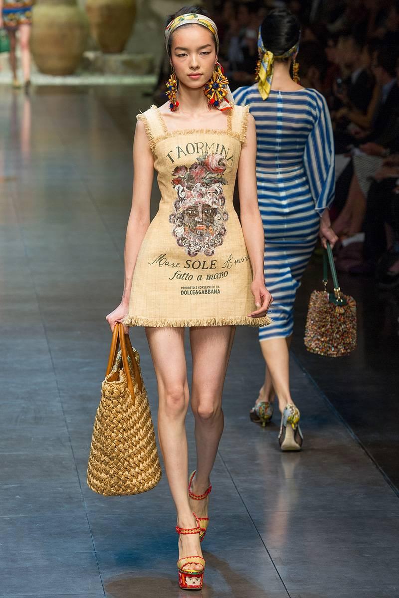 Dolce & Gabbana raffia dress from 2013 controversial collection dress.
Fashion Fail: Dolce &Gabbana Collection Embraces “Slave Culture,” But Not Black Models?


HARPER'S BAZAAR RUSSIA COVER FEATURES A CONTROVERSIAL DOLCE &GABBANA 
BURLAP-SACK
