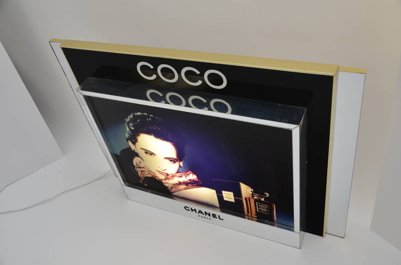 Coco Chanel Perfume Advertisement Large Sign Featuring Ines De La Fressange 1985.
Very rare and impossible to find ,one of a kind sign.
Could be used for home decor.
Sign is plug in and Ines face will light up.
Approx.  measurements :Length 40