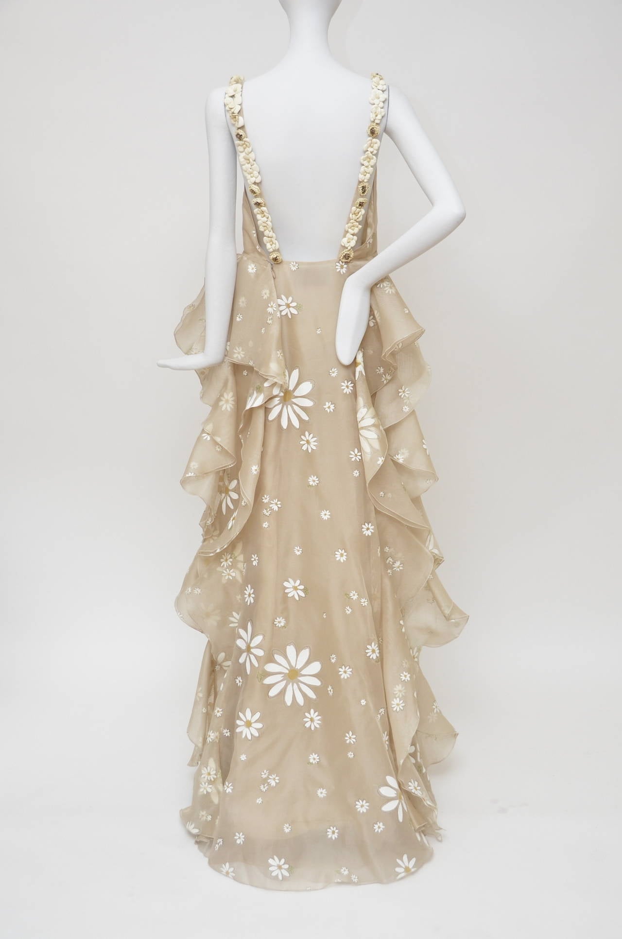 Valentino silk long dress with daisy flower print.
Gorgeous  daisy flowers look like they have been hand painted.
Brand new with tags.Sized 8 but this dress have been purchased from Europe and i believe this is uk sizing.Please see the approximate