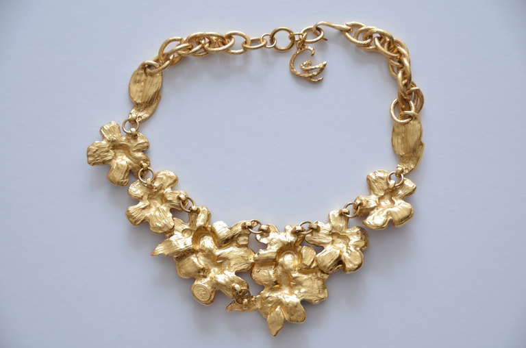 Christian Lacroix Gilt With  Enamel Flower Necklace/Choker.
Excellent like new condition. Large sparkling round, square and  pear shaped rhinestones  in different colors are placed throughout the necklace.
Gold plating is perfect.

FINAL SALE.