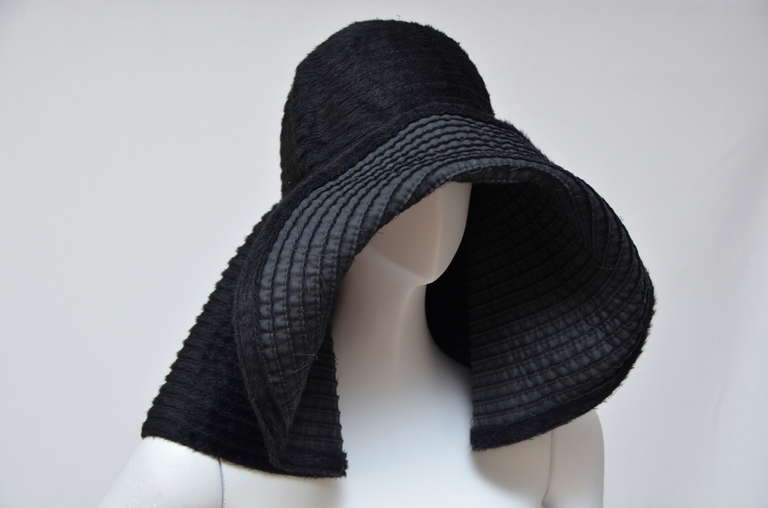 YSL new with tags floppy hat.
Black alpaca Yves Saint Laurent wide brim floppy hat. 
Designer size 58.M.
Fabric Content: 65% Alpaca, 35% Wool; Lining 91% Cotton, 9% Polyurethane
Final Sale.