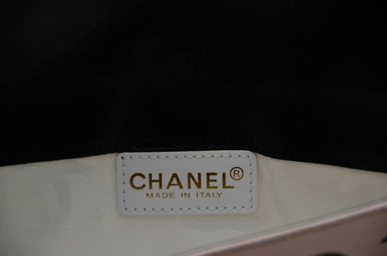 Chanel Camellia  Clutch Handbag In Excellent Condition In New York, NY