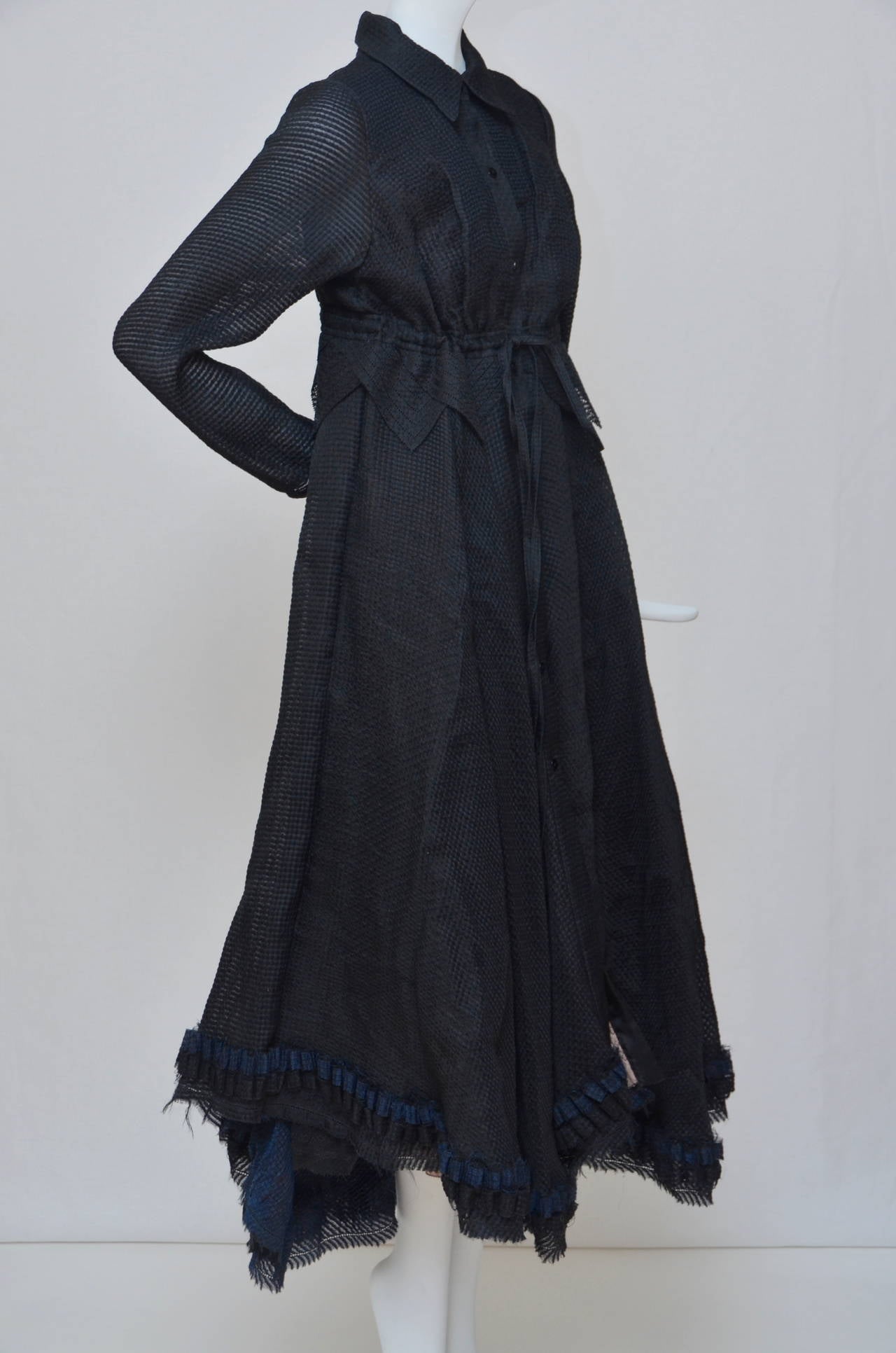 Isabel Toledo black dress.
Inside dress is all lined except sleeves.Bottom part of the dress have additional tulle mesh lining beside silk and it is adding a volume look to it..Button down closure in the front.
Size 8.Made in USA.
End of the