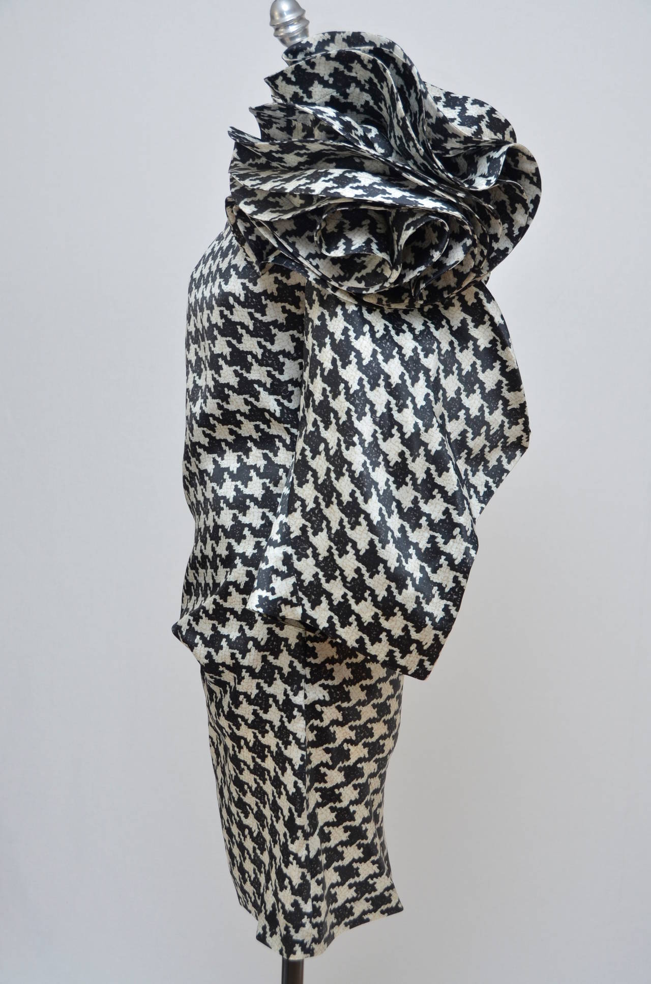 Alexander McQueen Houndstooth print dress.
Extremely rare and collectible 2009  runway dress.
For collectors and museums.
New with tags.
This stunning dress is from one of the last Alexander McQueen collections as seen on the picture with him