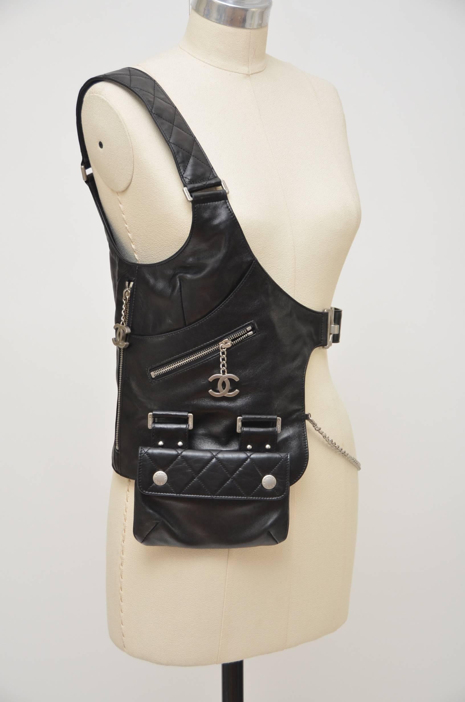 Chanel runway fall 2003 lambskin harness vest.
Very stylish and must have for Chanel collector.Worn under Chanel tweed jackets on the runway but this beautiful versatile  piece can be worn with pretty much anything....over dress , with jeans or