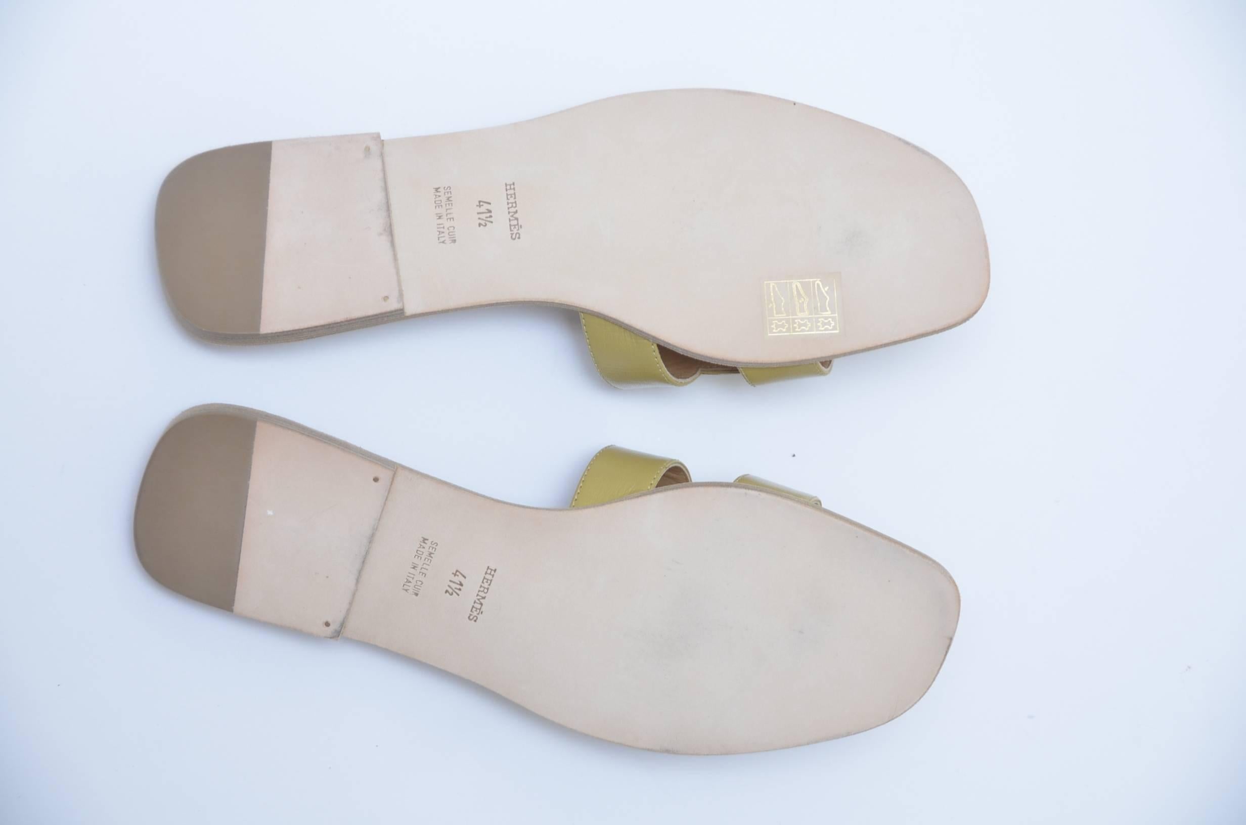 Hermes H olive sandals.
Size 41.5.Color:Gingembre .
New with box.
Made in Italy.

FINAL SALE.