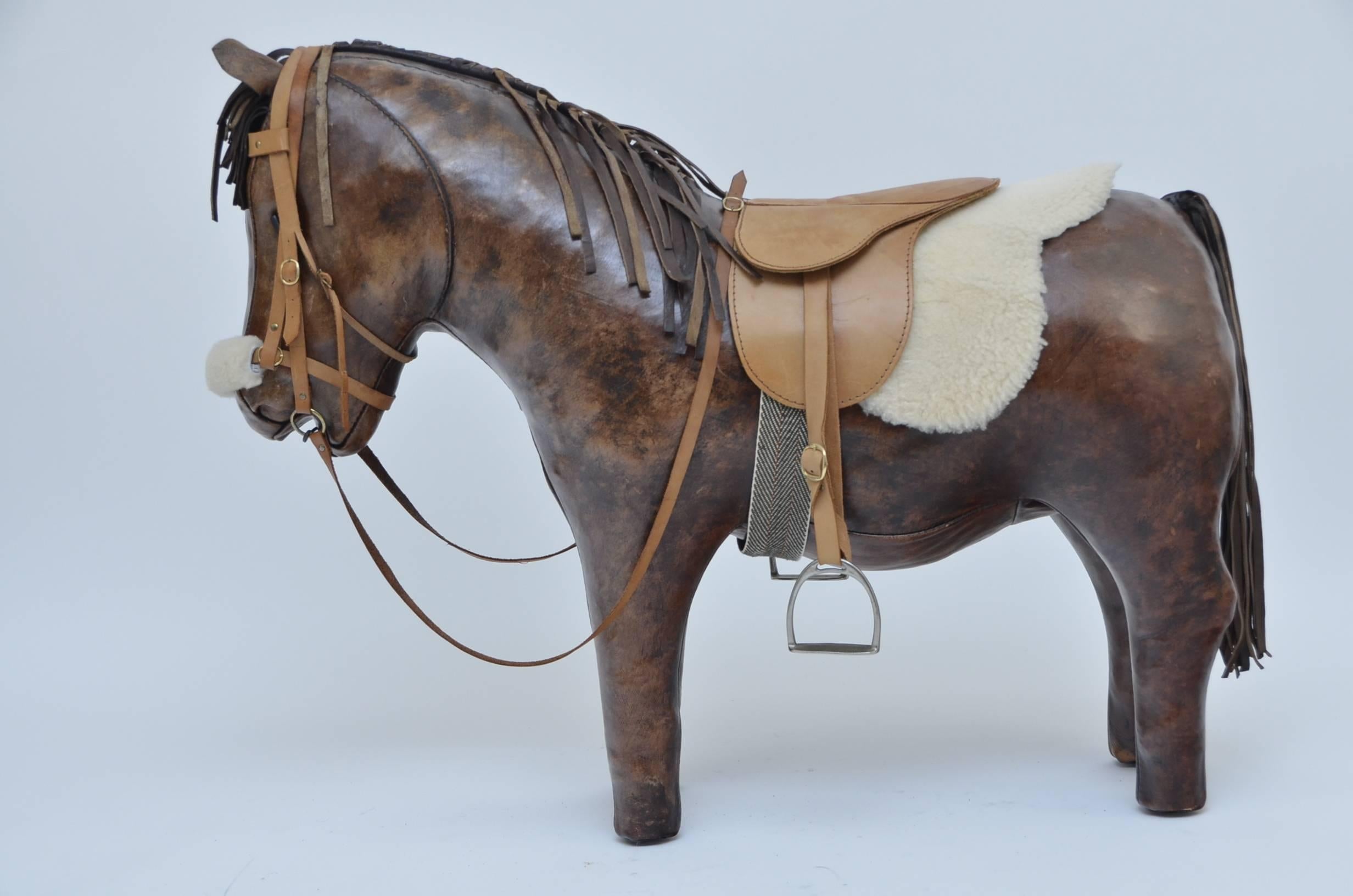 Leather Horse Toy  By Dimitri Omersa For Abercrombie & Fitch.
Excellent vintage condition.
Few marks as photographed but  this beautiful rare footstool is in amazing condition over roll.Amazing quality craftsmanship that's hard to find now