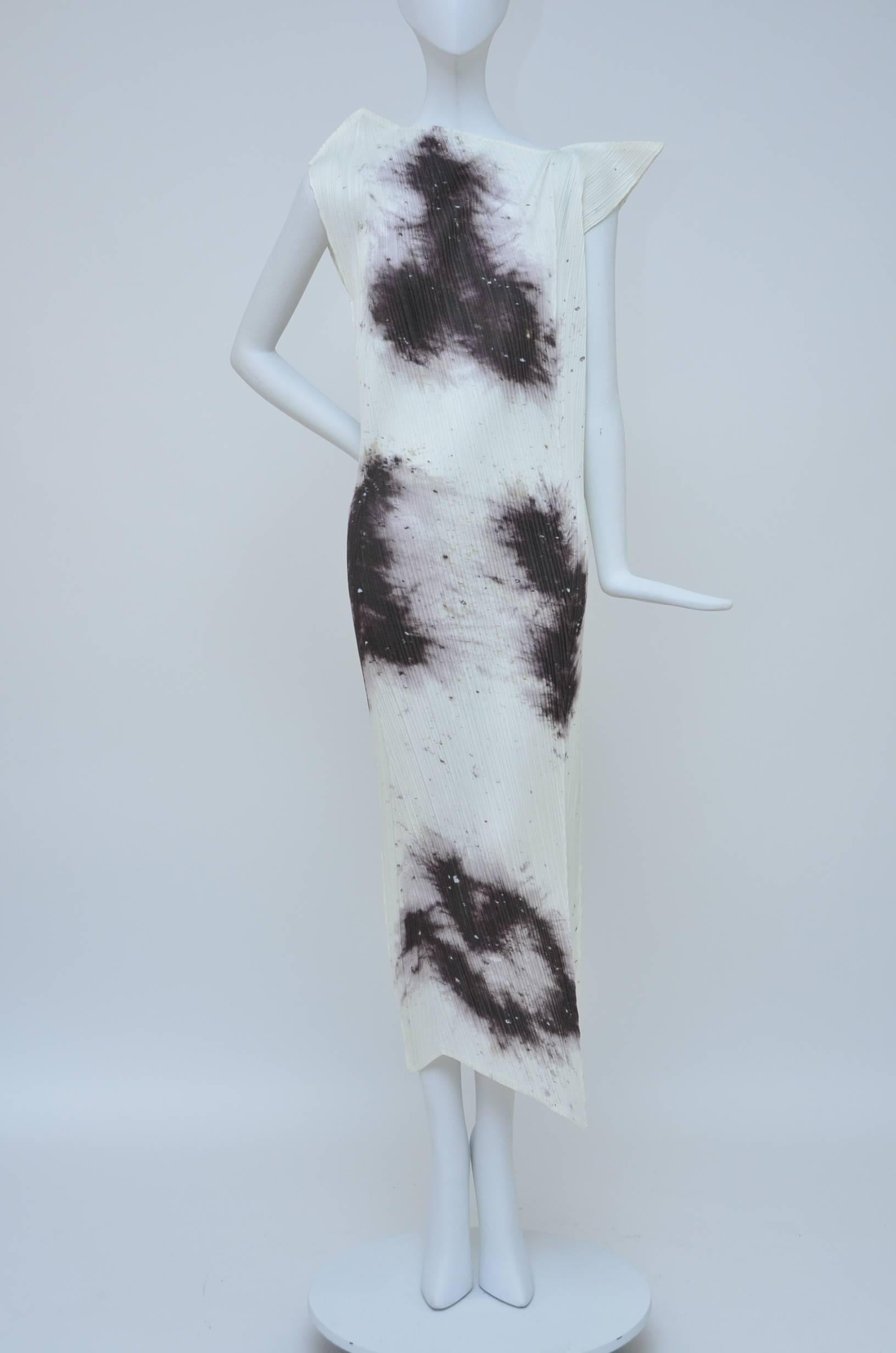 Issey Miyake/Cai Guo-Qiang printed 'gunpowder' dress.
Guest Artist, Series #4. Size 3.
Pleated polyester fabric  with abstract gunpowder trail print to front and back, asymmetric neckline with points to shoulder and hem.
Approx. measurements :Bust