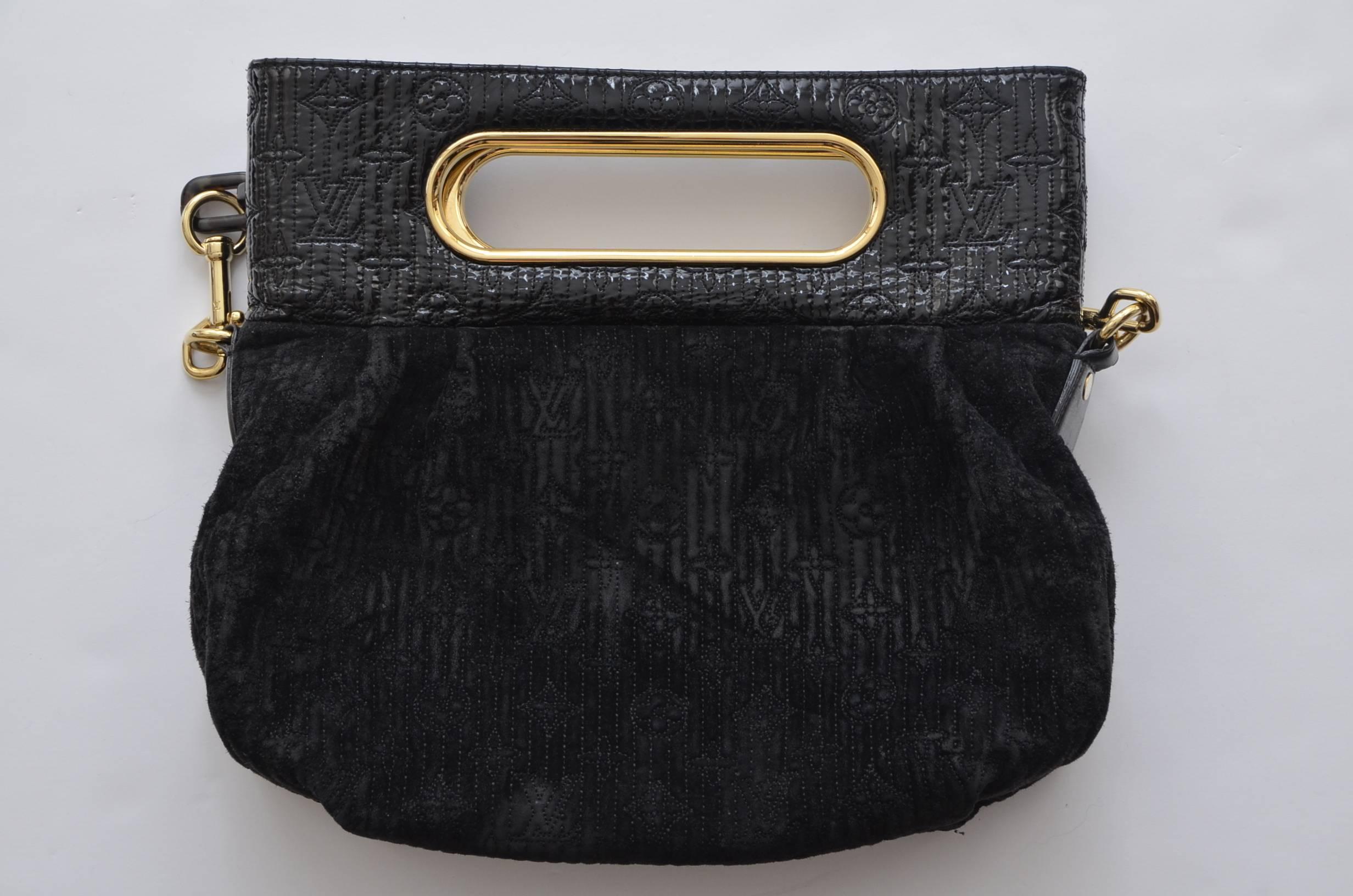 Louis Vuitton velvet fabric mix with patent leather clutch/handbag.
Approximate measurements L 13.5