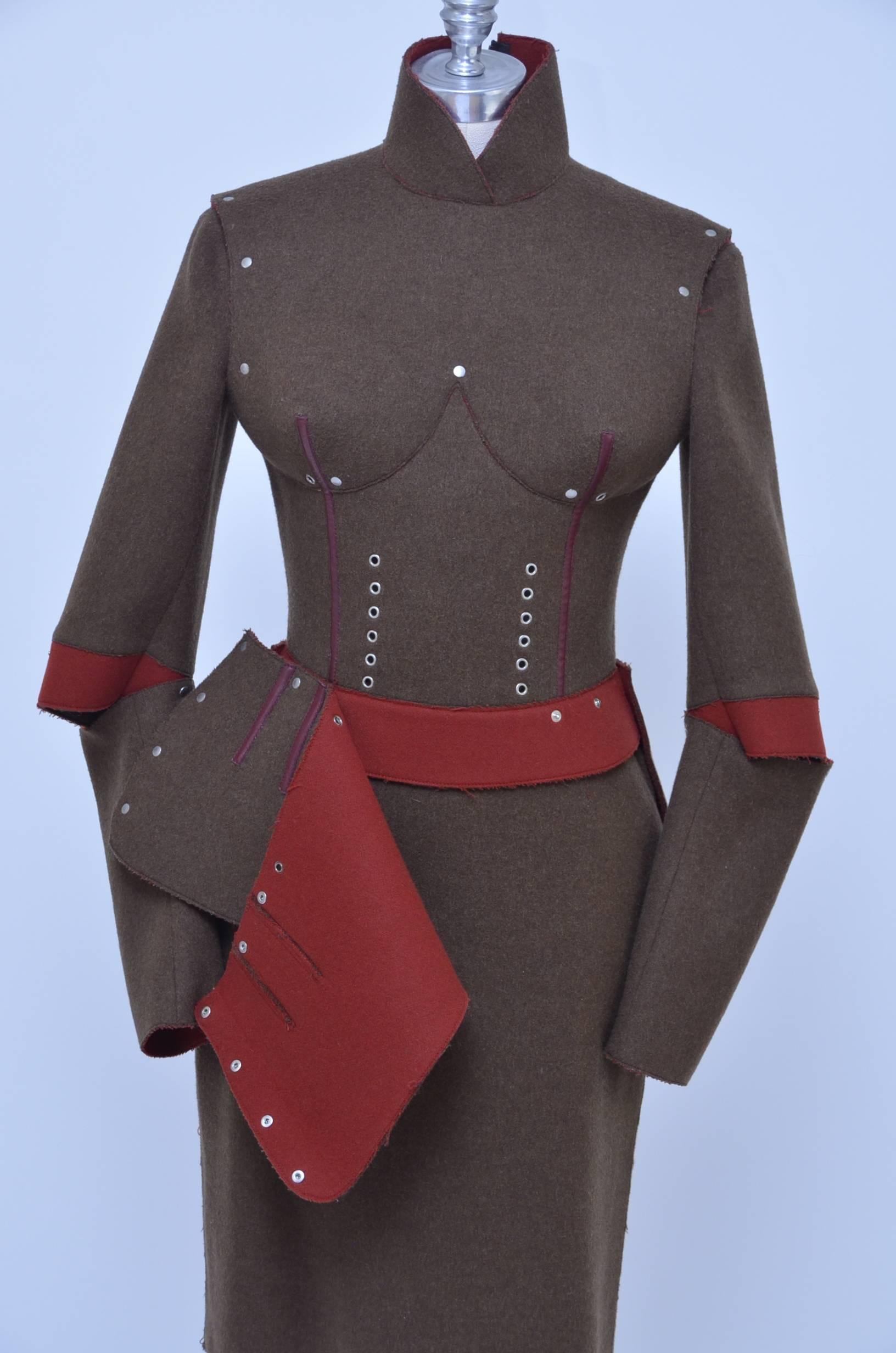 Jean Paul Gaultier Pour Gibo iconic breast cone suit.
Design and details on this rare suit is absolutely amazing and it a great piece to be exhibited at museums.
High collar jacket,zipper closure on the back and padded breast cone's inside for 