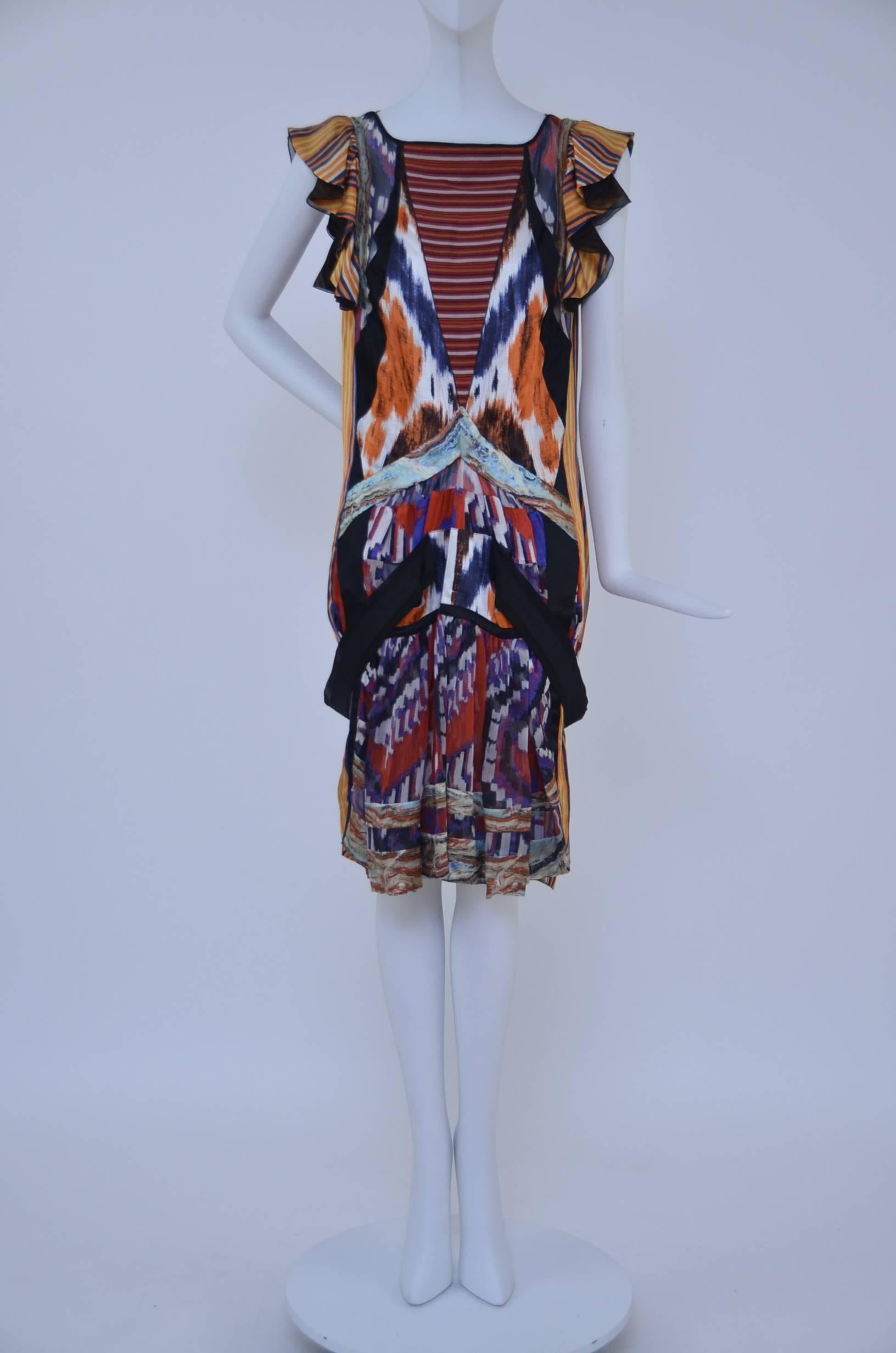 Balenciaga   Nicolas Ghesquière  Runway Silk Ikat print dress .
Condition:Excellent new without tags.
Very collectible collection.
Fabric contents label tag missing but fabric is 100% silk.
Some parts of the dress are sheer and slip is