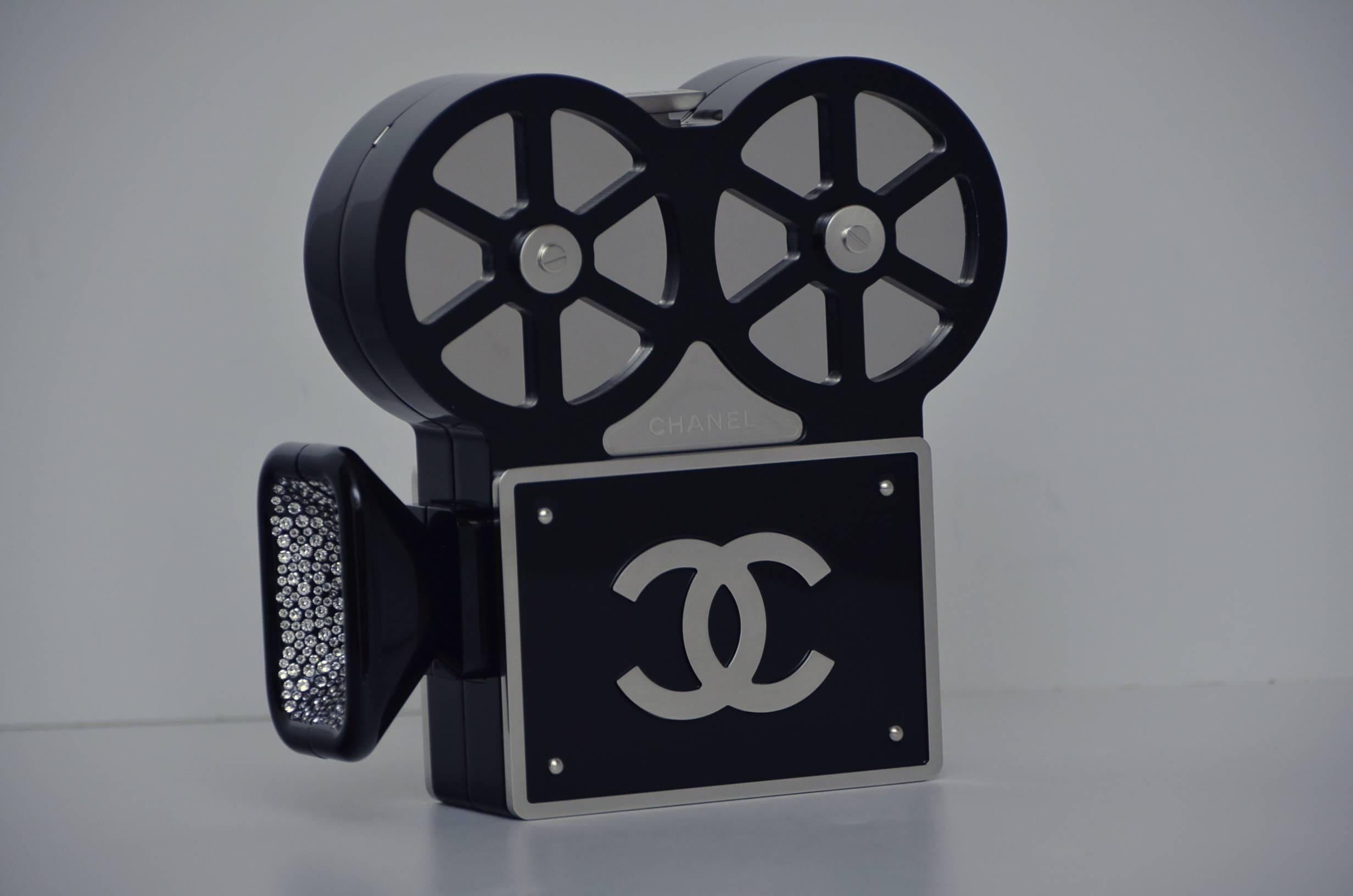 This year for their legendary Métiers d’Art collection, Chanel presented Paris in Rome – an epic show set in Cinecittà, Italy’s famous film studios. One of the most coveted pieces from the runway collection was this  camera bag. 
Made of