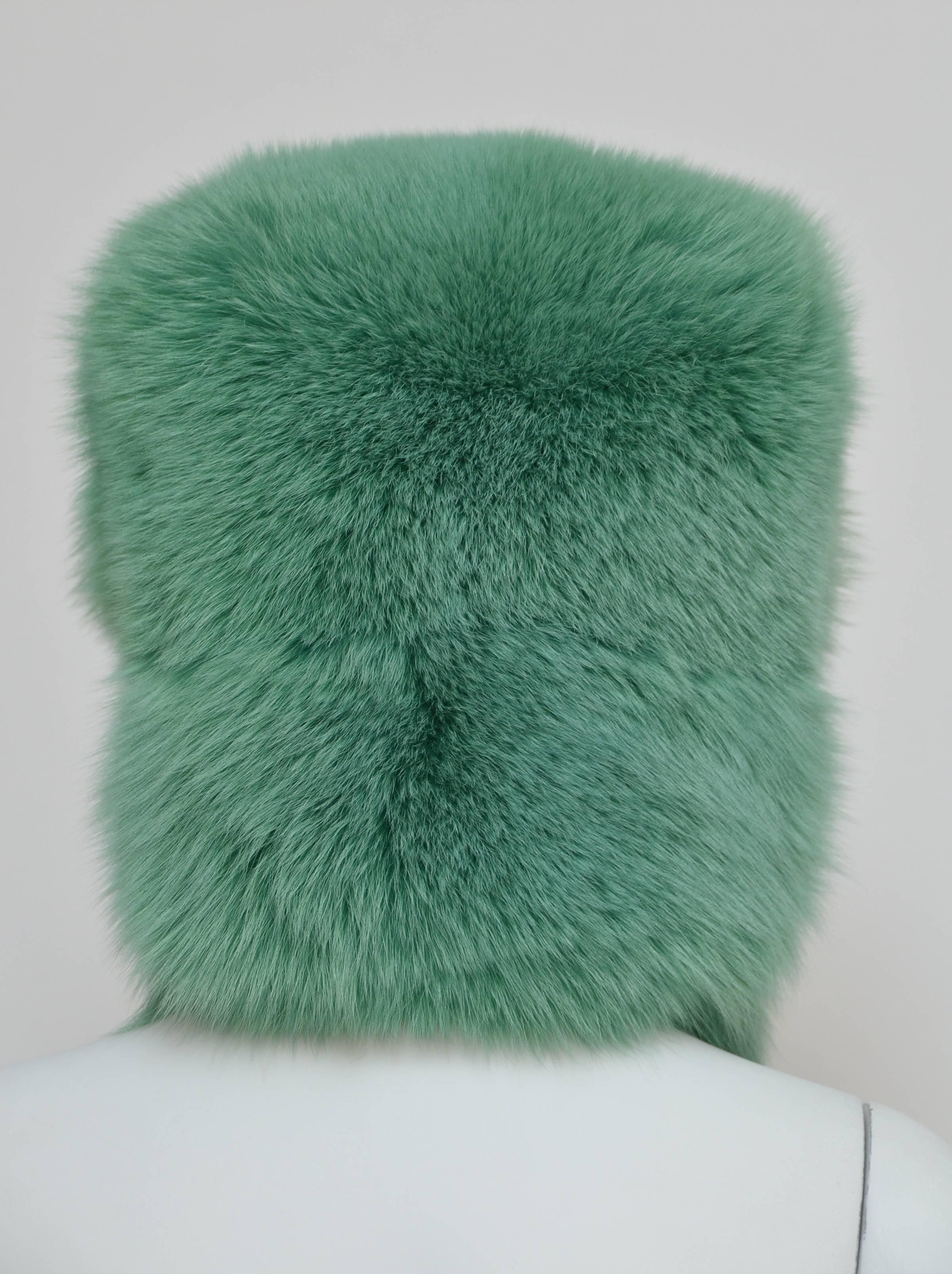 green fur hat