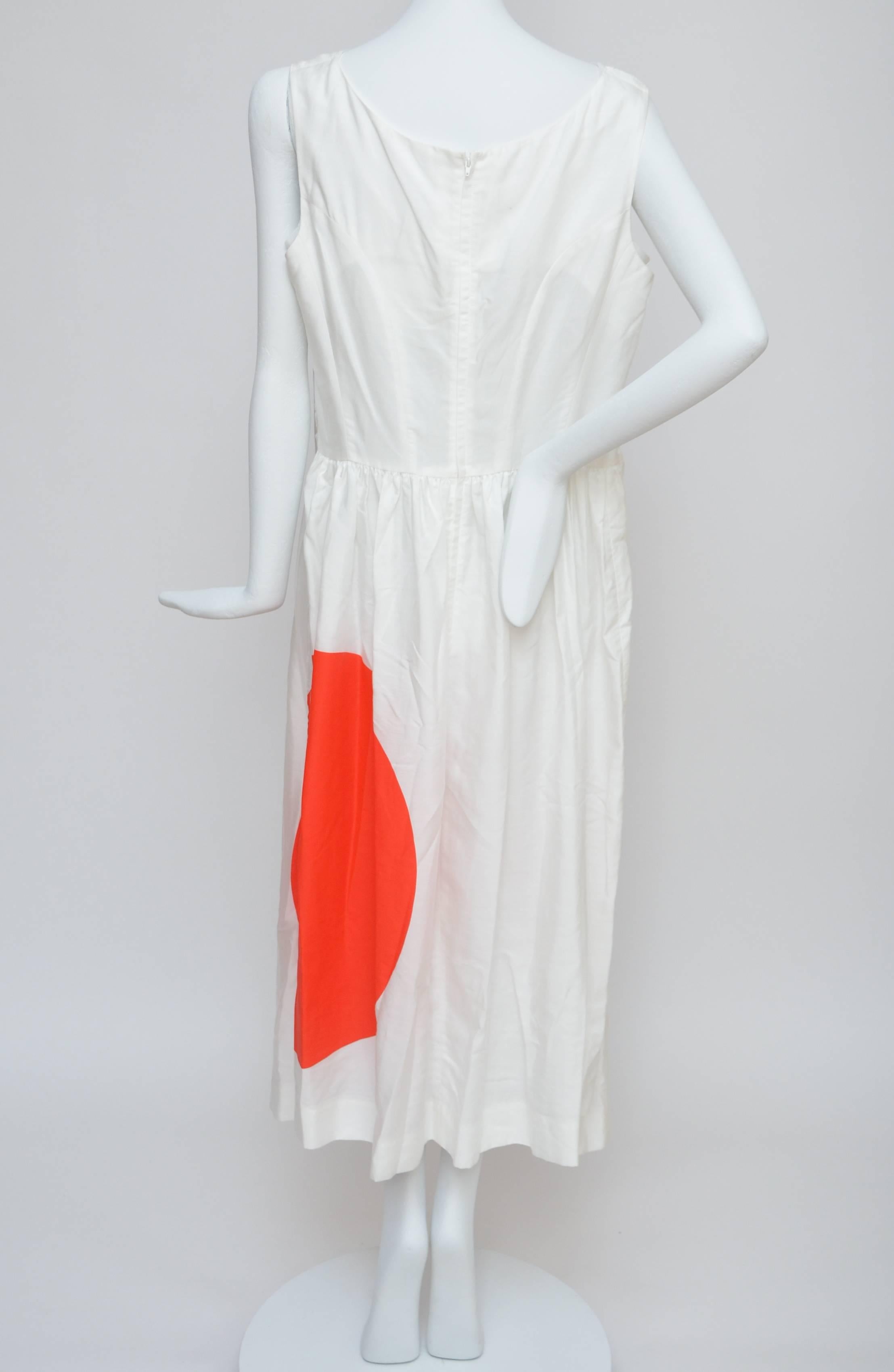 Comme Des Garcons dress from "Rising Sun " collection.
White cotton mix with tulle fabric.Lined in tulle.
Excellent condition,fabric feels new with couple marks from storage that can easily be cleaned.
Size L.
Made in japan.

FINAL