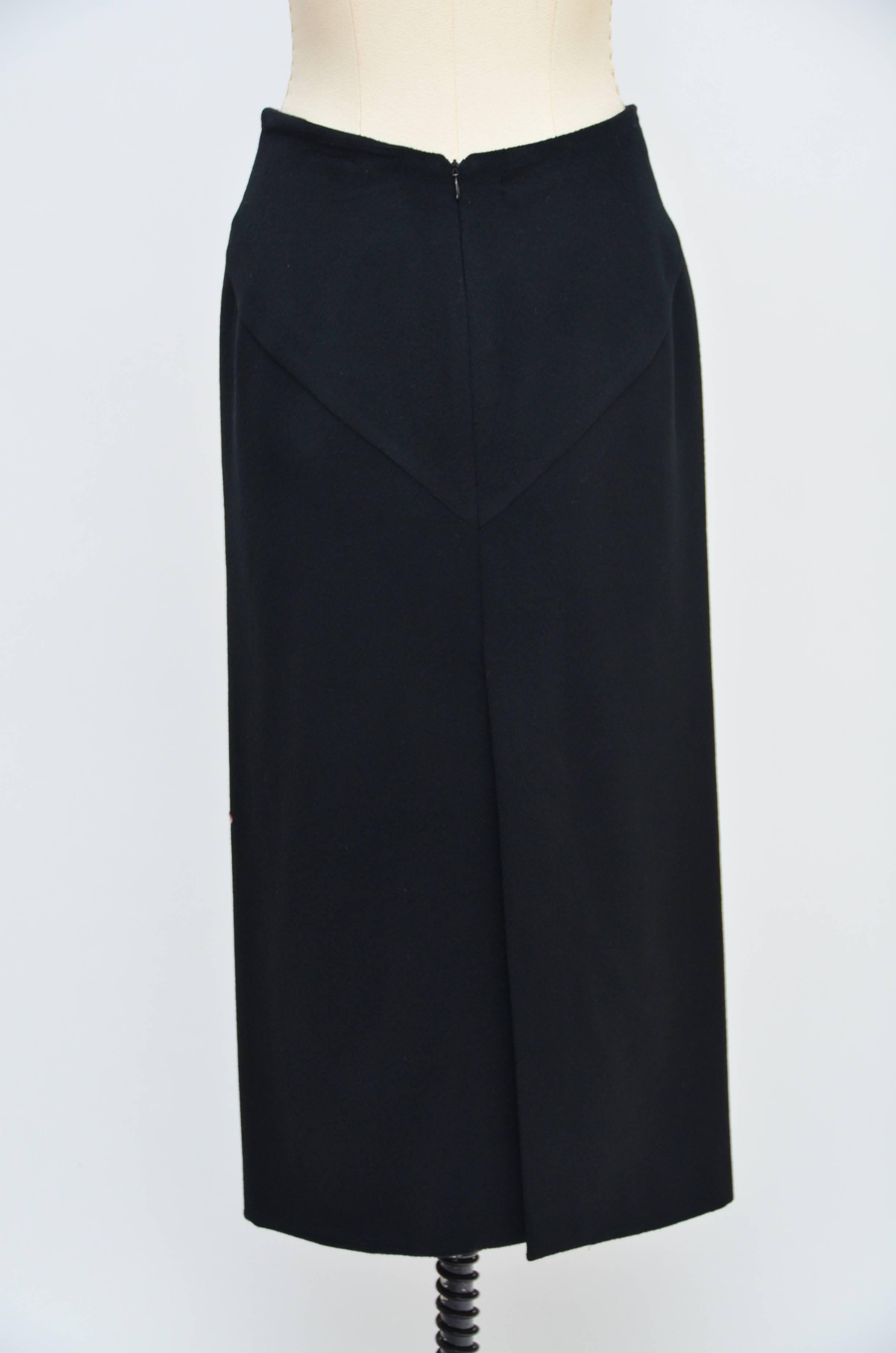 Alexander McQueen Joan Collection Embellished Skirt 
Autumn/Winter 1998–99.
Fabric is cashmere and skirt is lined in red imprinted fabric.
High slit on the back.Zipper closure.Size 44.
Excellent condition.Photographed on the mannequin size 6