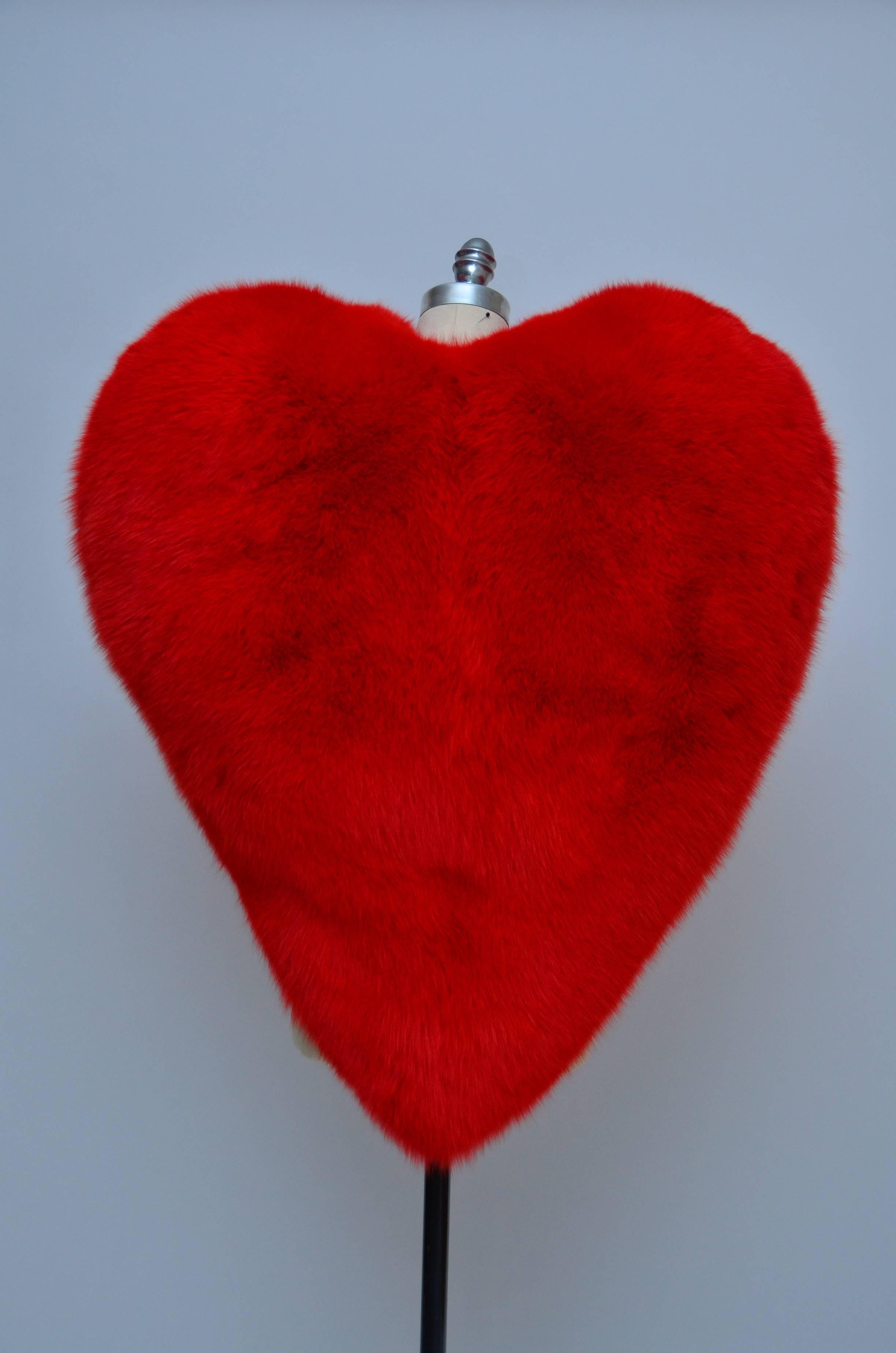 Famous Saint Laurent Heart fox cape.
Seen on the best dressed in fashion  and entertainment business as Anna Dello Russo and Rihanna......
Brand new with tags attached.
Size 38 FR.
Made in Italy.
Dyed fox fur from Finland.
Very easy to wear