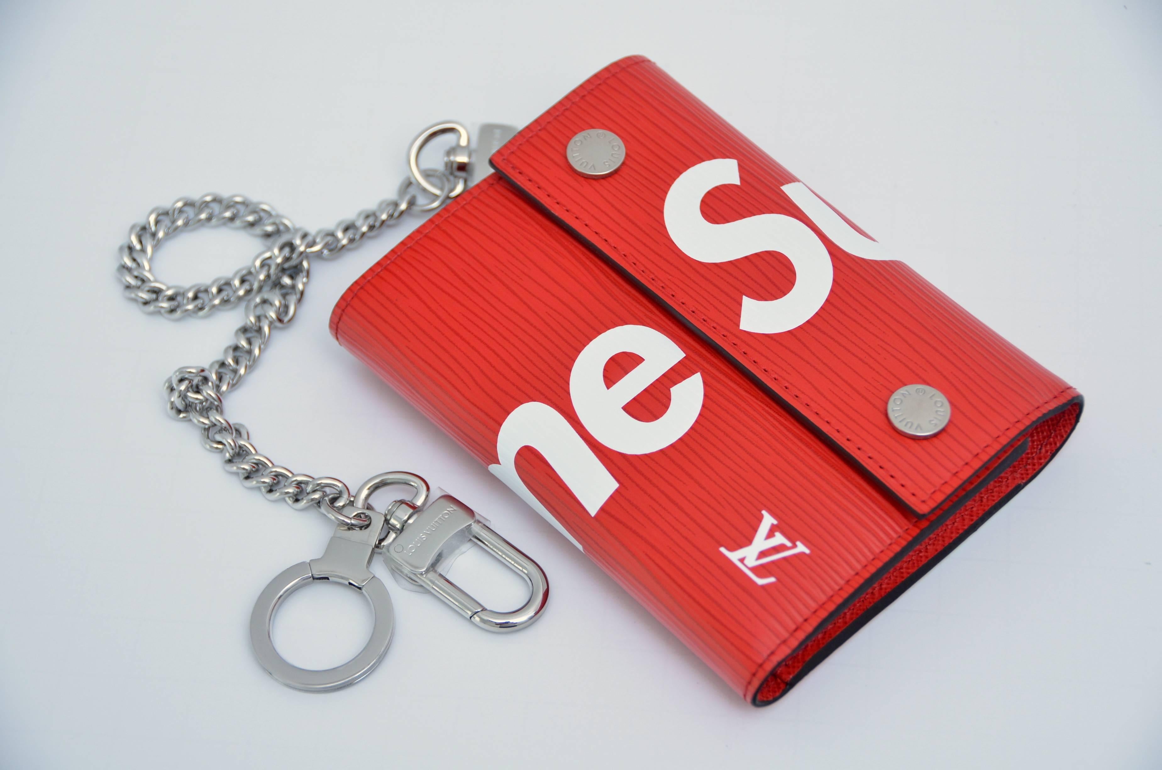 Louis Vuitton X Supreme Red Chain Wallet Epi Leather  
Due to camera flashlight item color might look different in person. 
Brand new . Copy of original receipt will be available to purchaser.
I can only send copy since there are multiple purchases