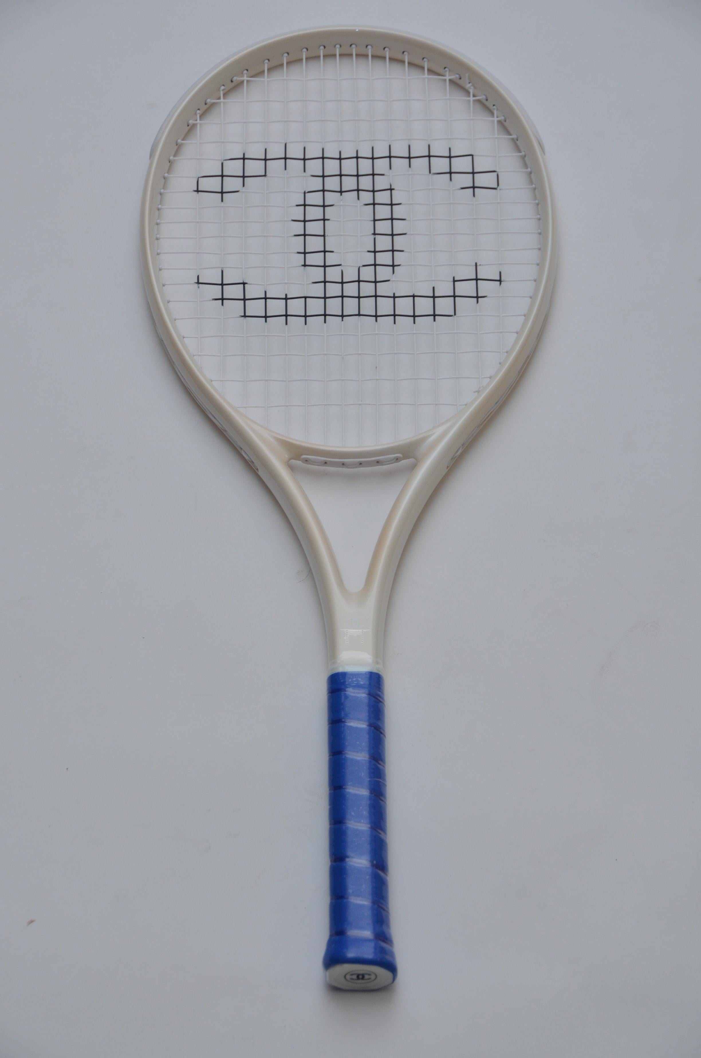 Chanel tennis racket in blue/ivory/black color combo. 
Brand new with tags,store fresh,never used ......



FINAL SALE.